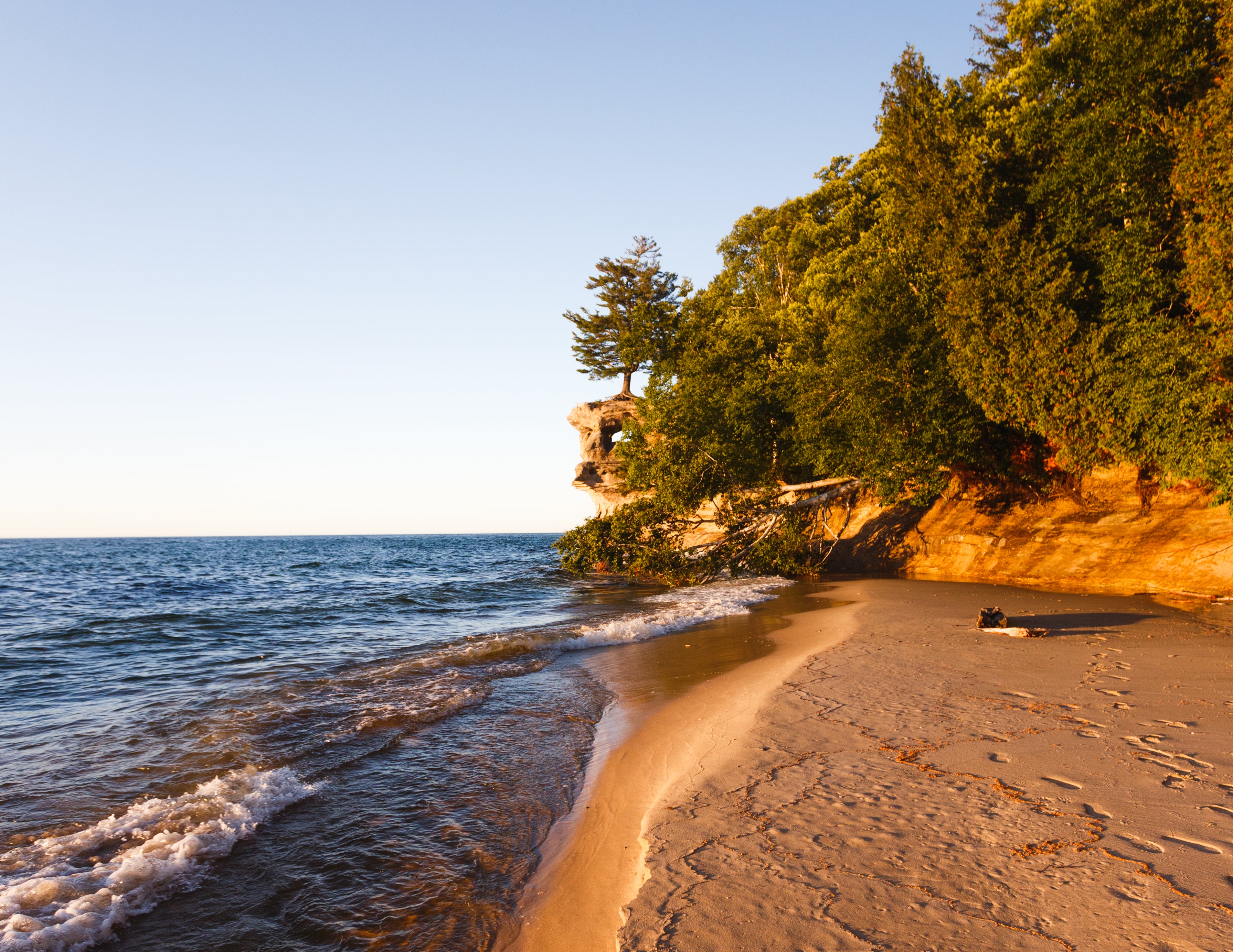 The crown jewel of Chapel Rock Beach is the lone 250-year-old pine tree that stands sentinel on a rock at the eastern end