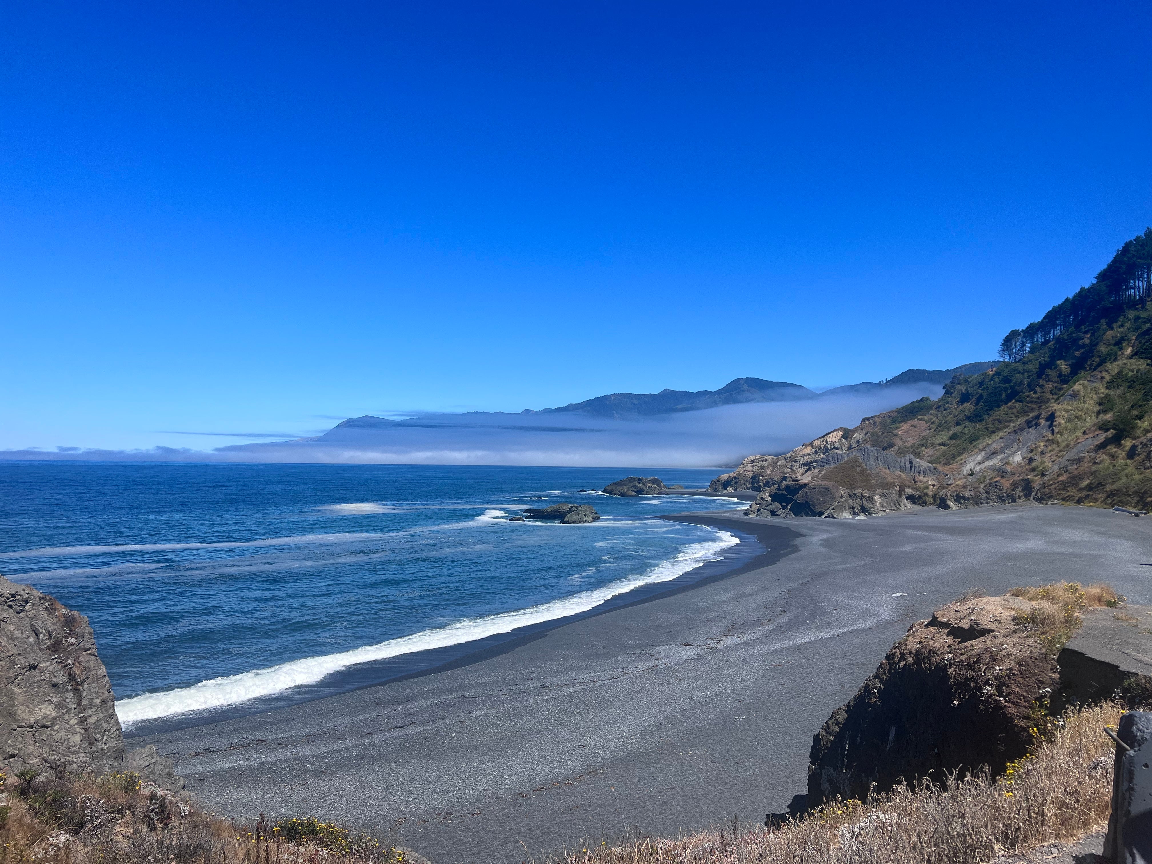 Little Black Sands beach, above, and adjacent Black Sands Beach have an edge-of-the-map vibe