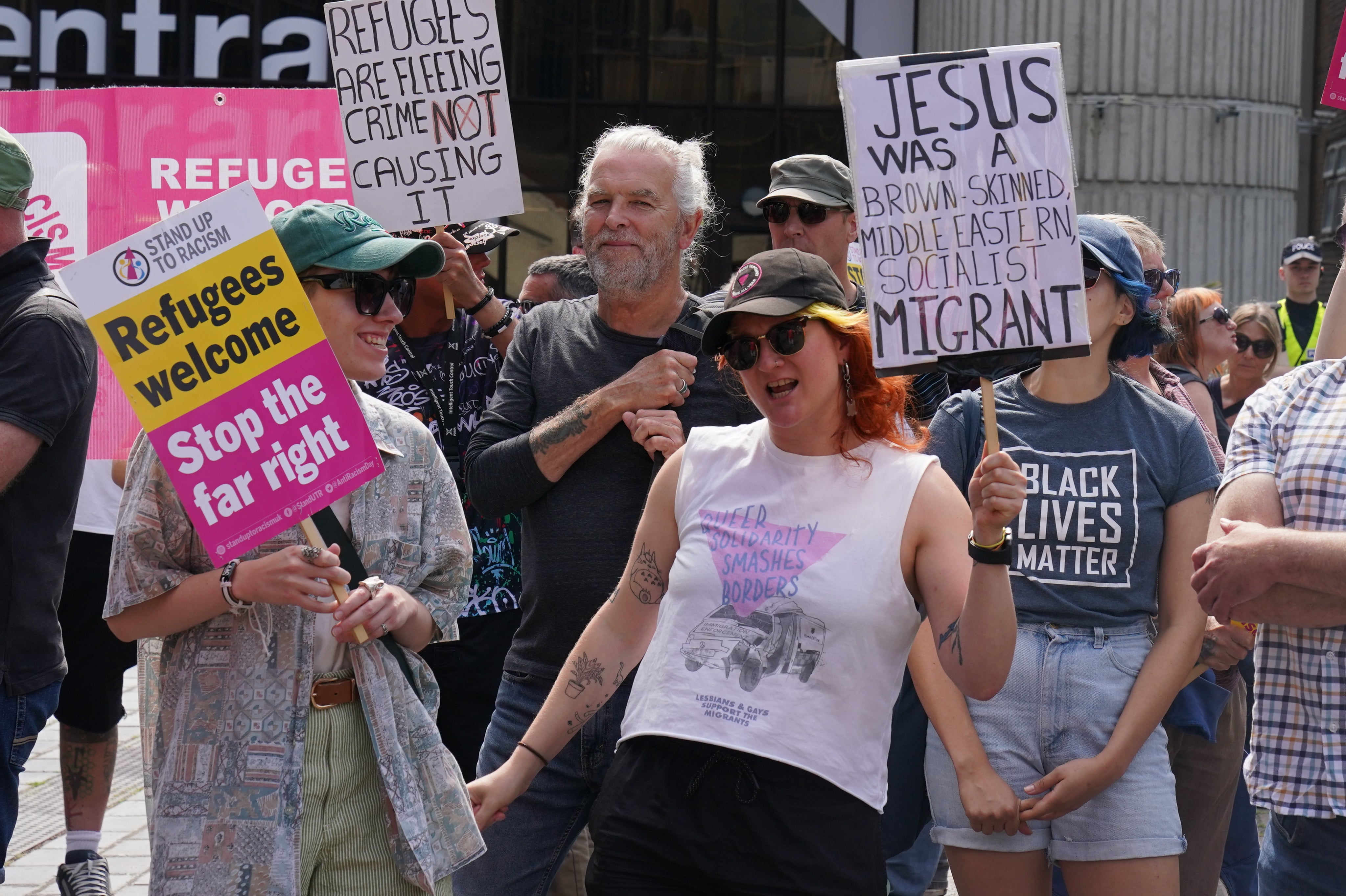 Stand Up to Racism counterprotesters in Guildhall Square, Portsmouth, faced off with anti-migrant groups