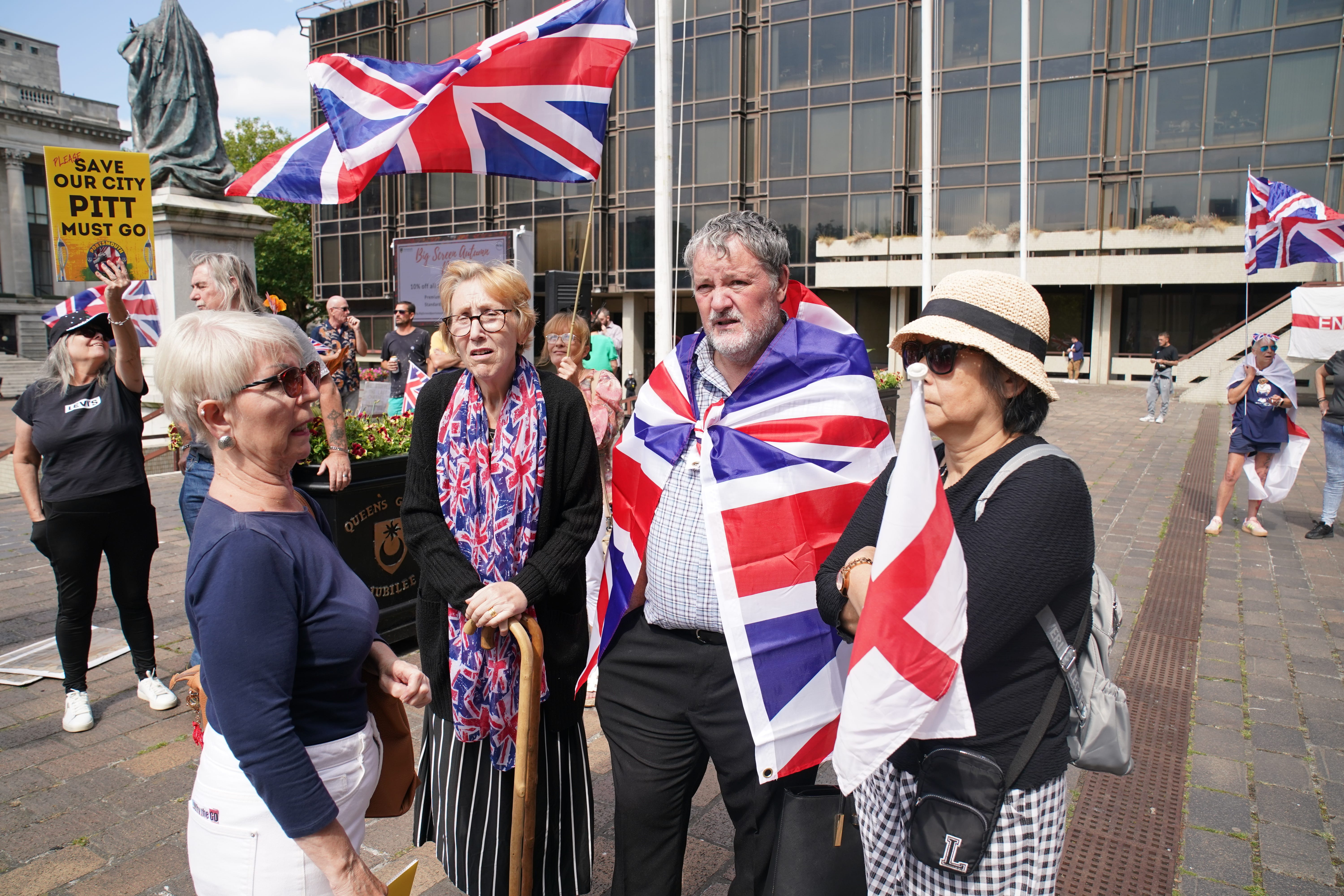 People take part in a counter protest at the Stand Up To Racism rally in Portsmouth (Gareth Fuller/PA)