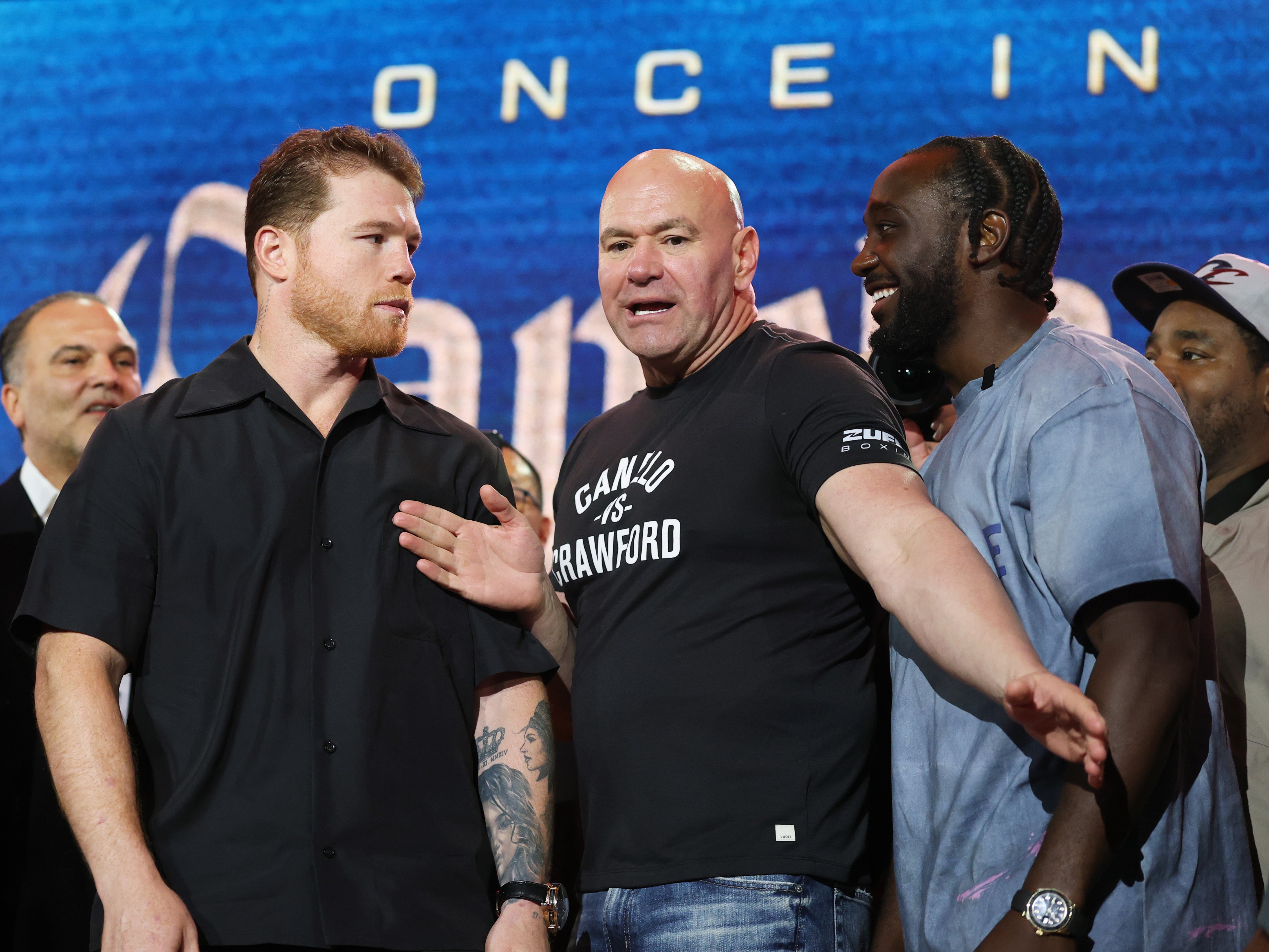Saul ‘Canelo’ Alvarez facing off with Terence Crawford (right)