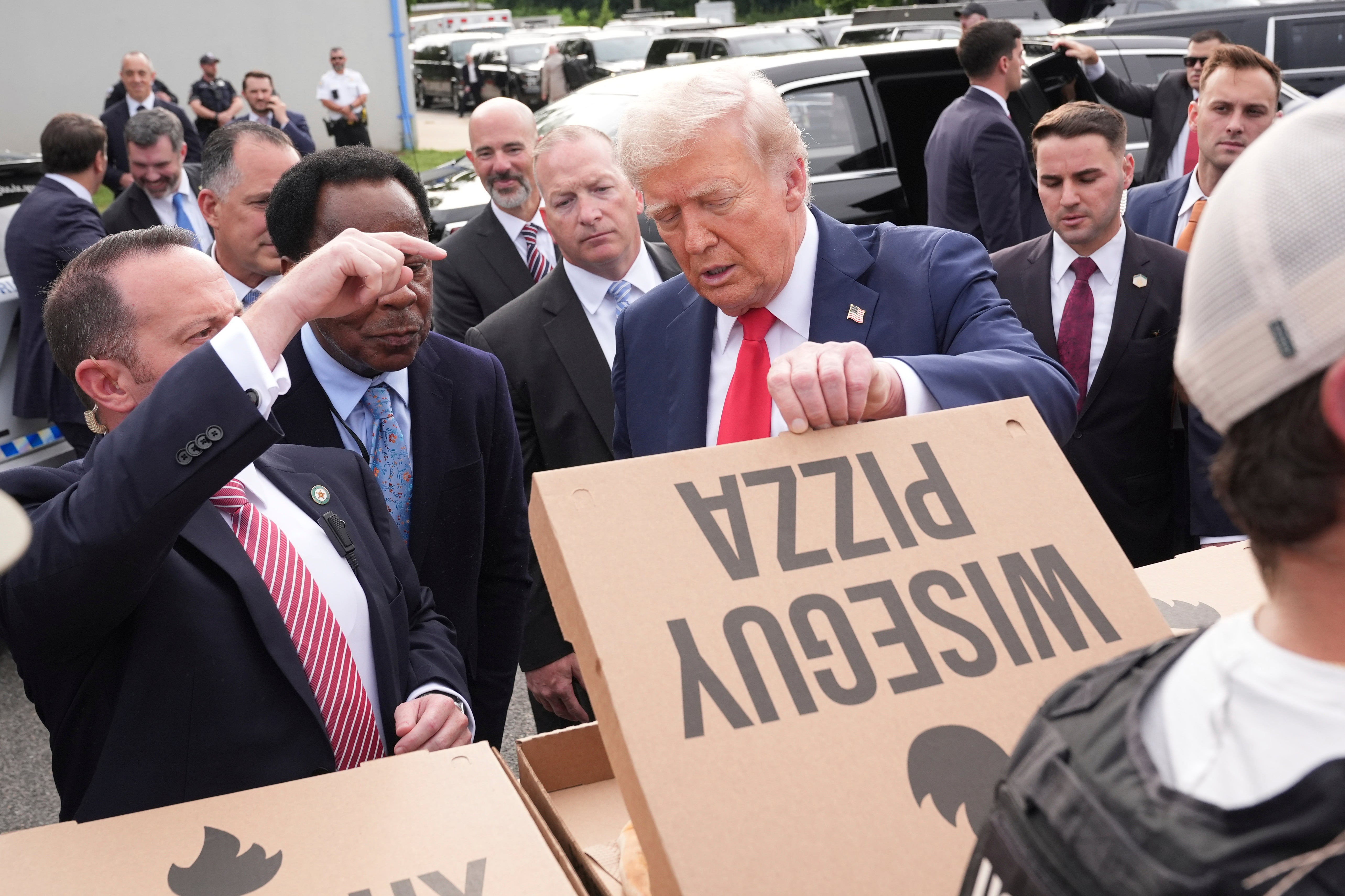 Why Trump was handing out pizzas to National Guard troops in DC