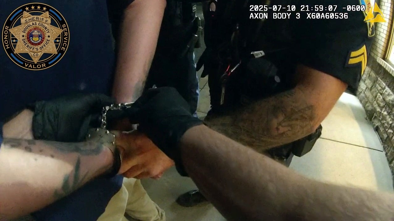 Body camera footage from July 10 just before 10 p.m. shows police handcuffing the man