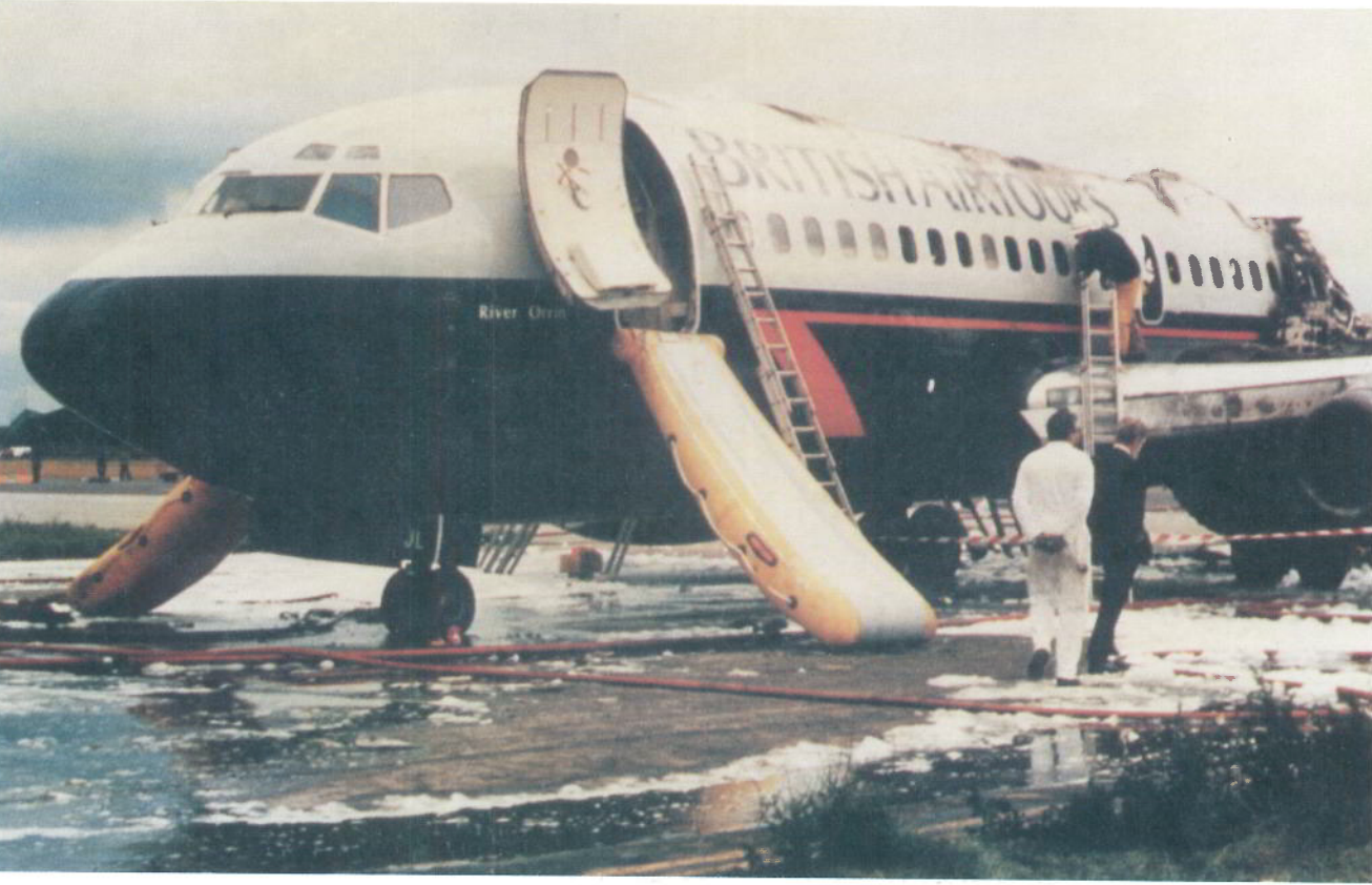 Aftermath: Investigators at the stricken Boeing 737 aircraft at Manchester airport on 22 August 1985