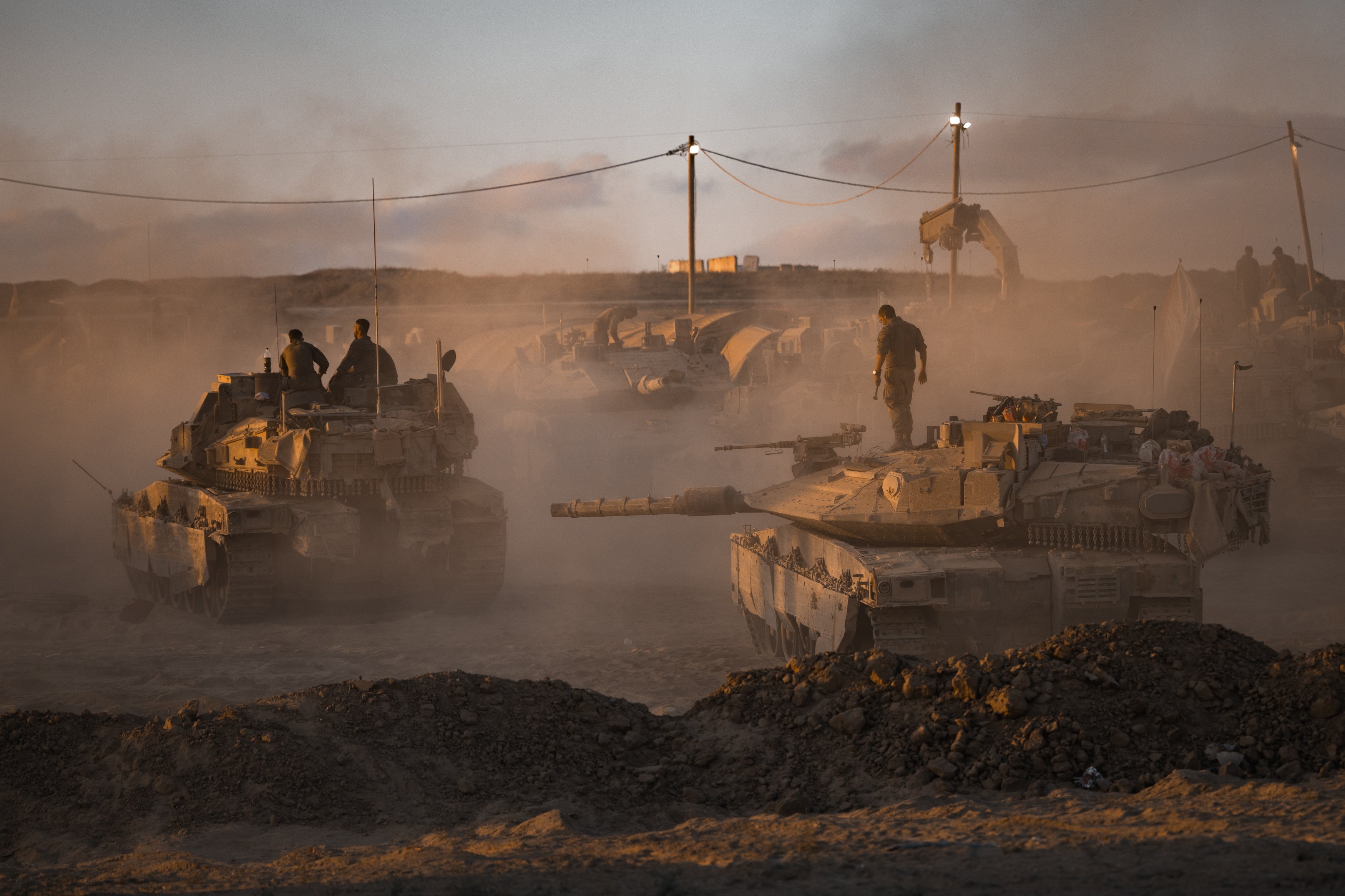 Israeli soldiers prepare tanks near Gaza’s northern border