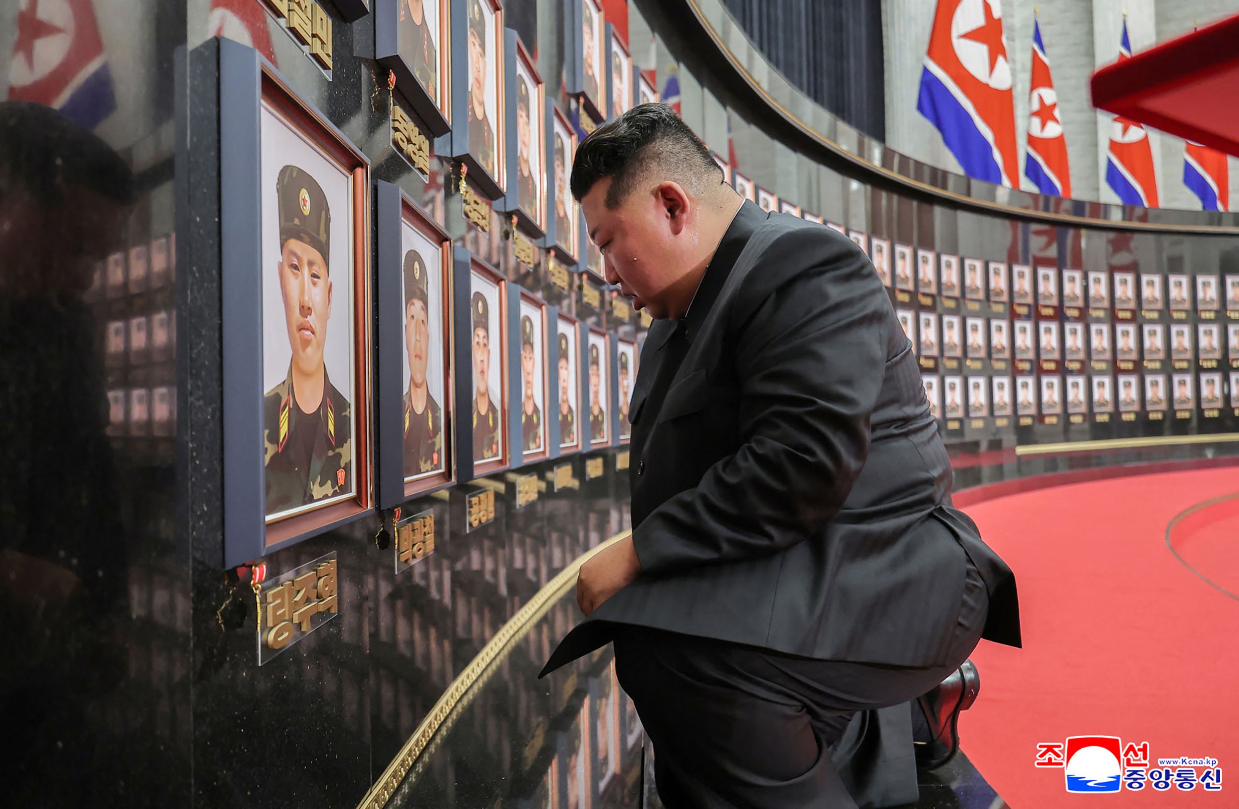 North Korean leader Kim Jong Un visiting the memorial wall at a ceremony to award state commendations