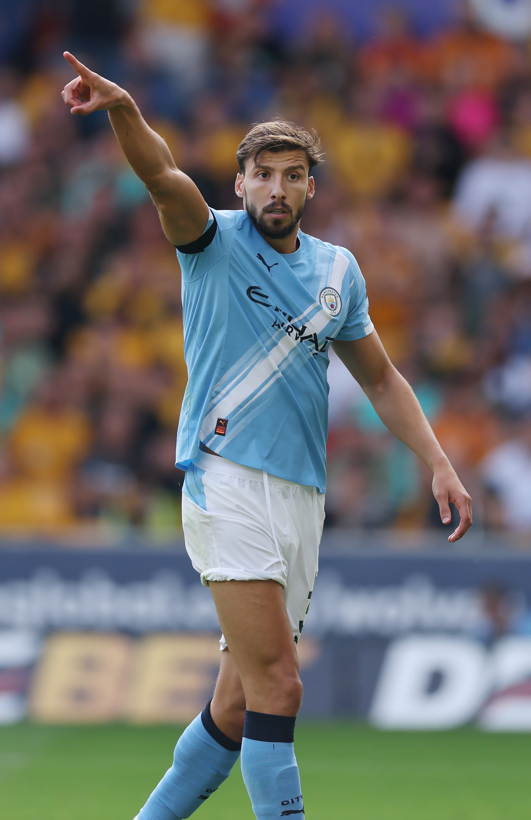 Ruben Dias of Manchester City looks on