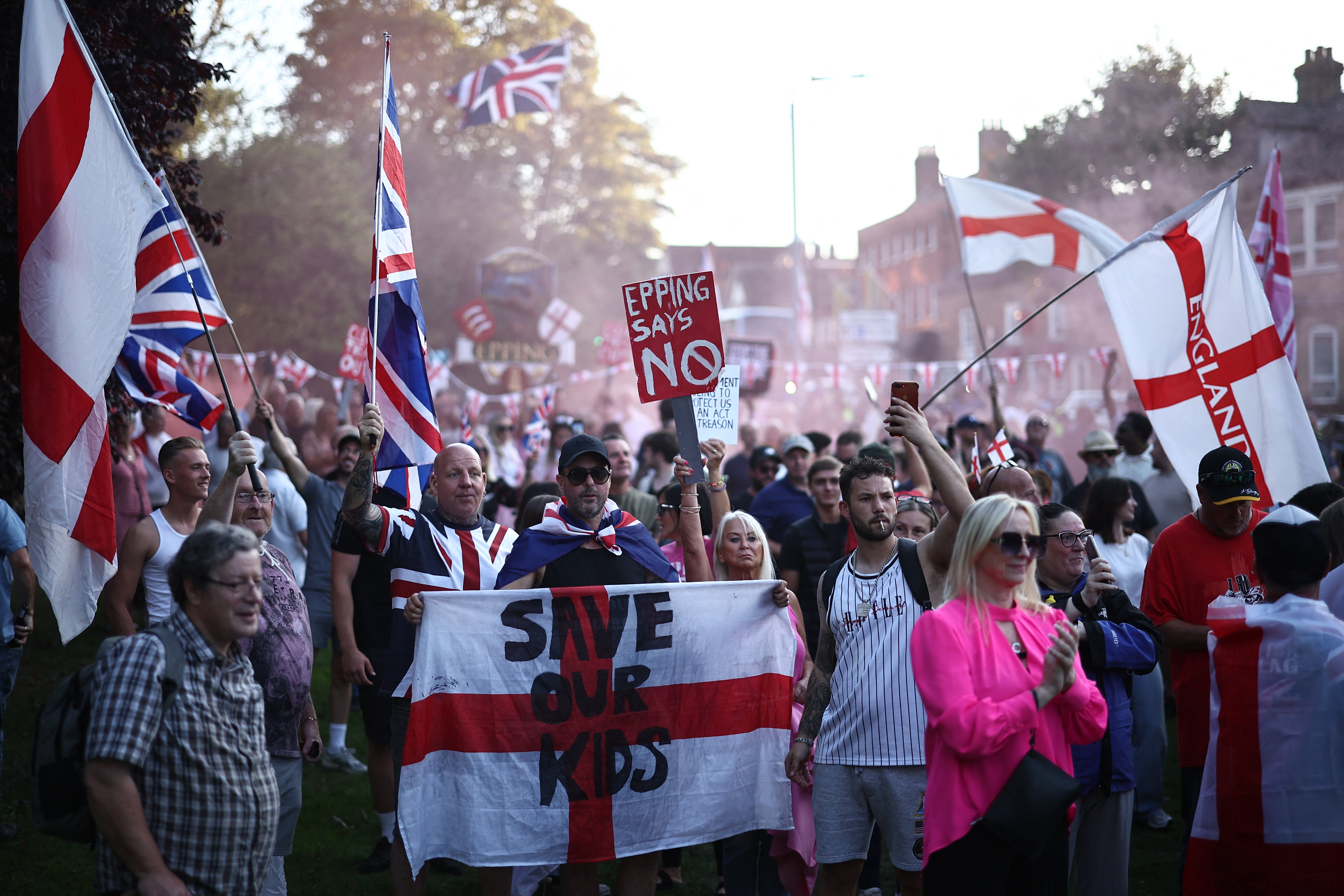 Protesters gather outside The Bell Hotel in Epping