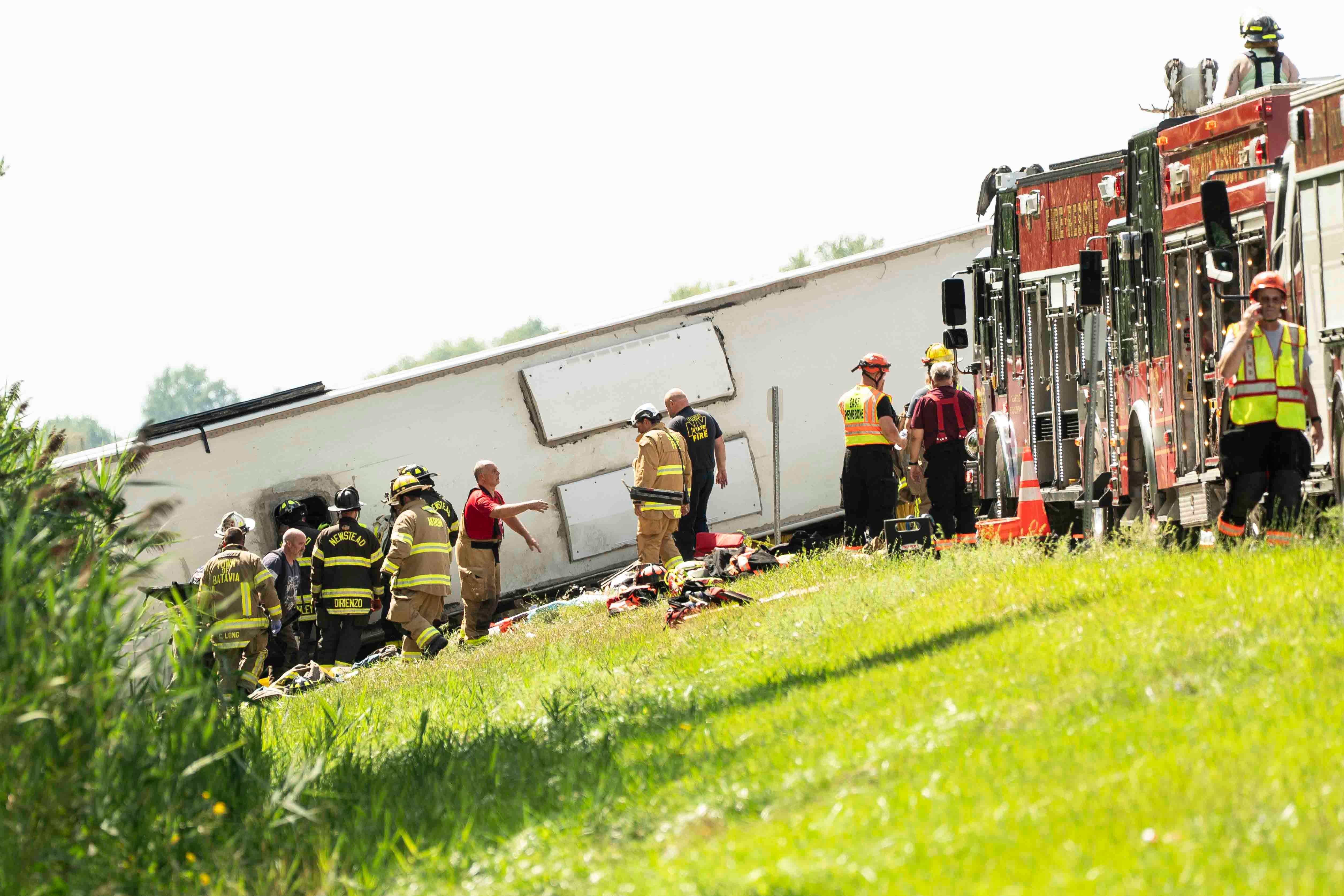 Five adults died in a tourist bus rollover crash Friday that was returning to New York City from Niagara Falls