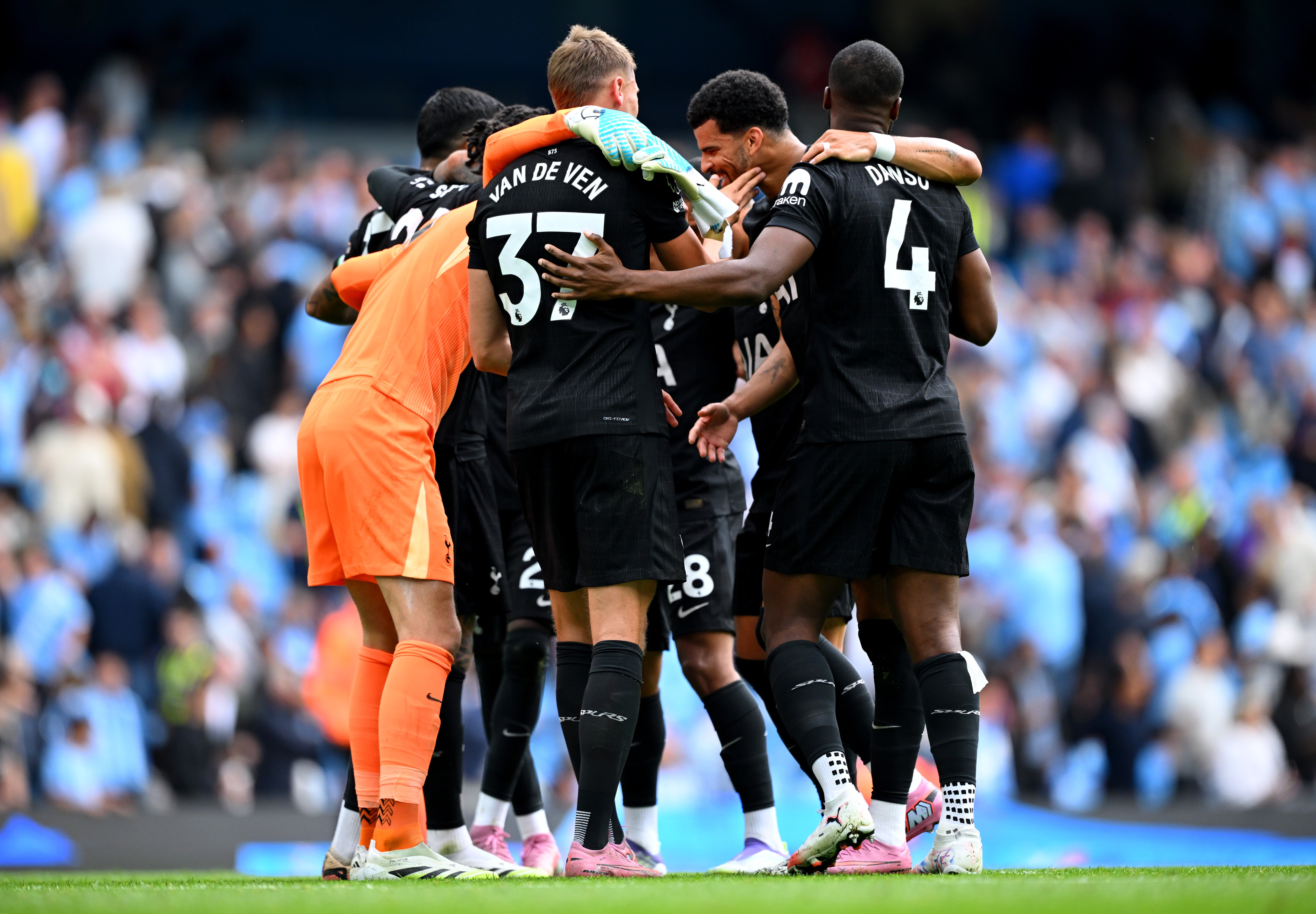 Tottenham's players celebrate their 2-0 win at Manchester City