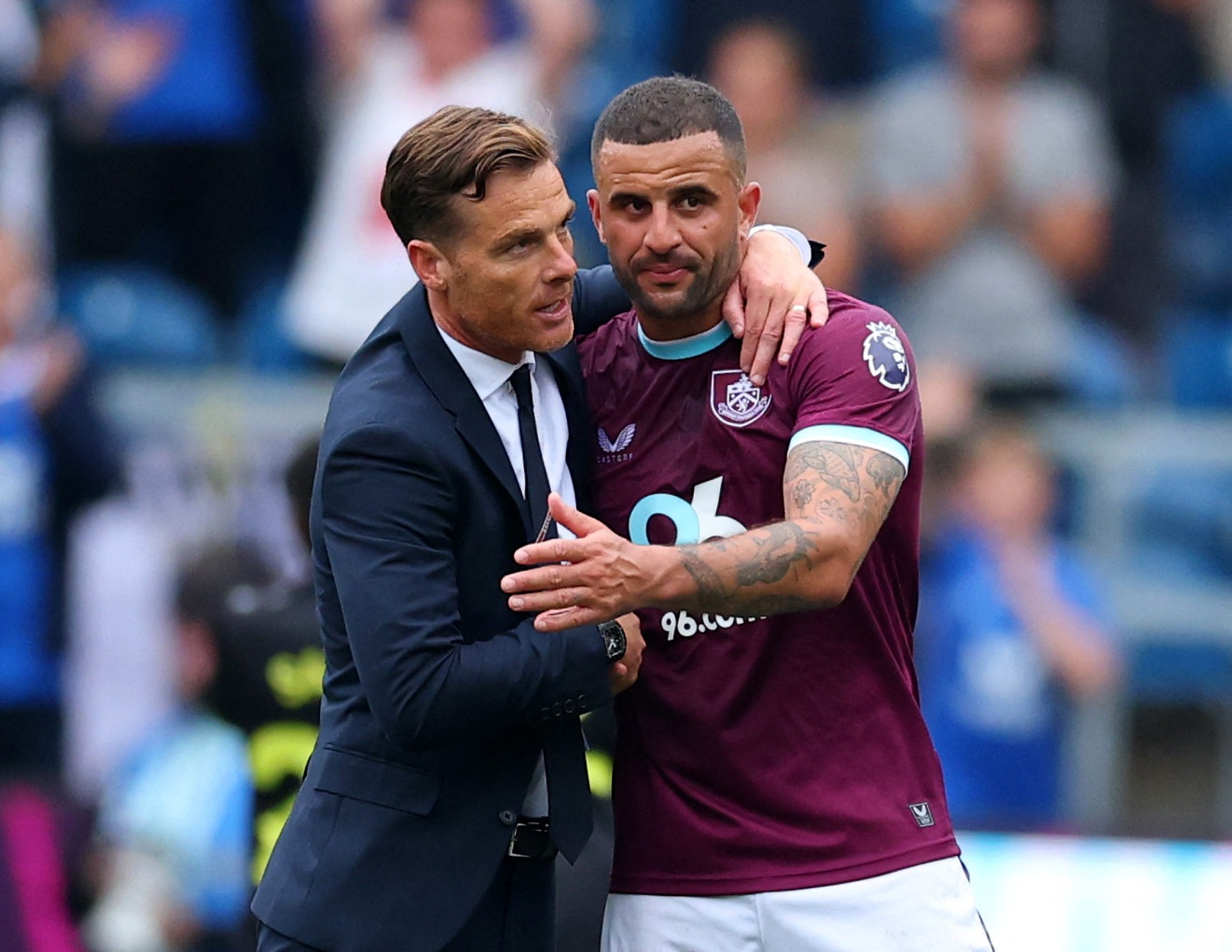 Scott Parker and Kyle Walker celebrate Burnley’s first win of the season