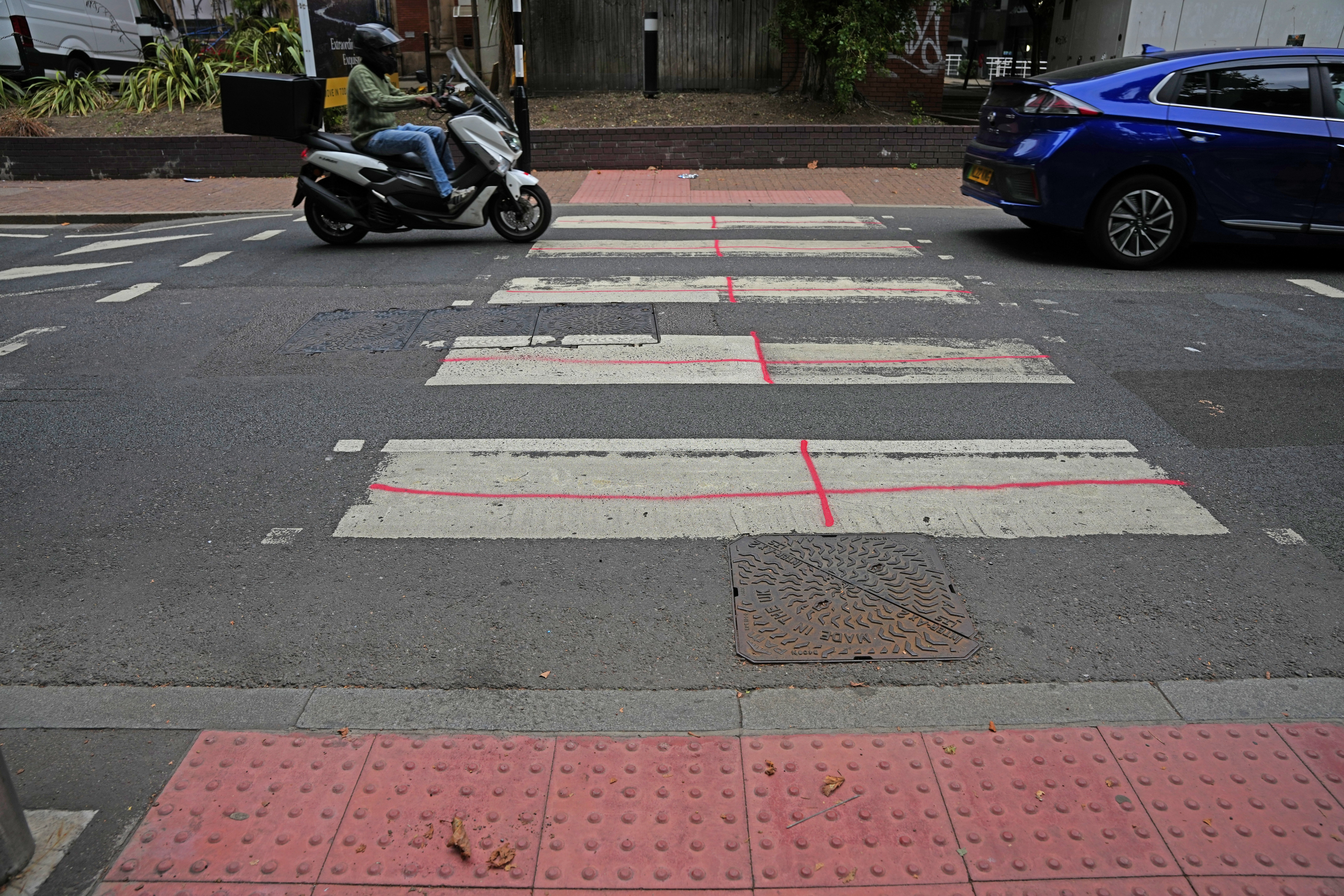 A pedestrian crossing that has been turned into St George's flags near the Britannia International Hotel in Canary Wharf, London.