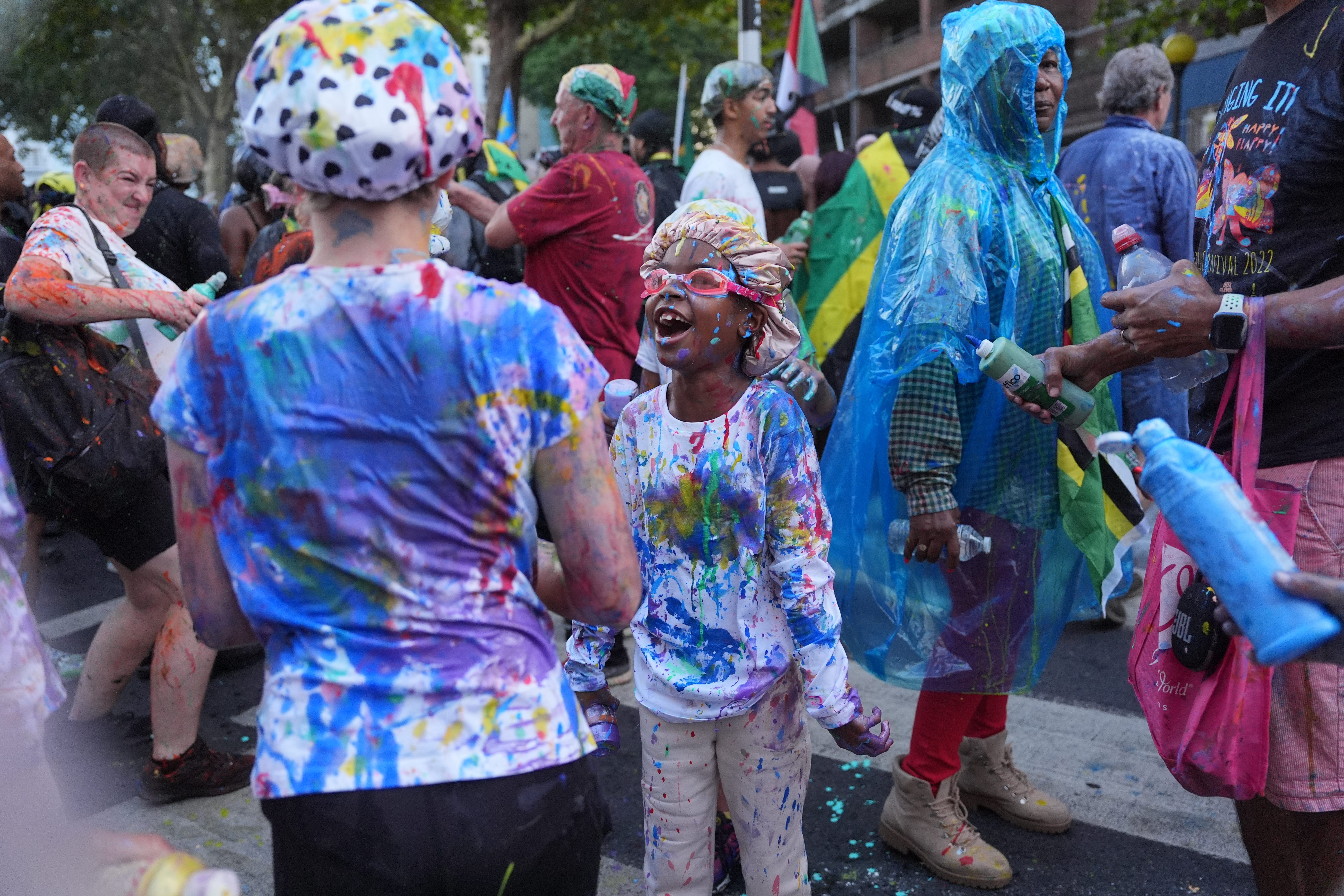 People taking part in J’ouvert ahead of the Children’s Day Parade