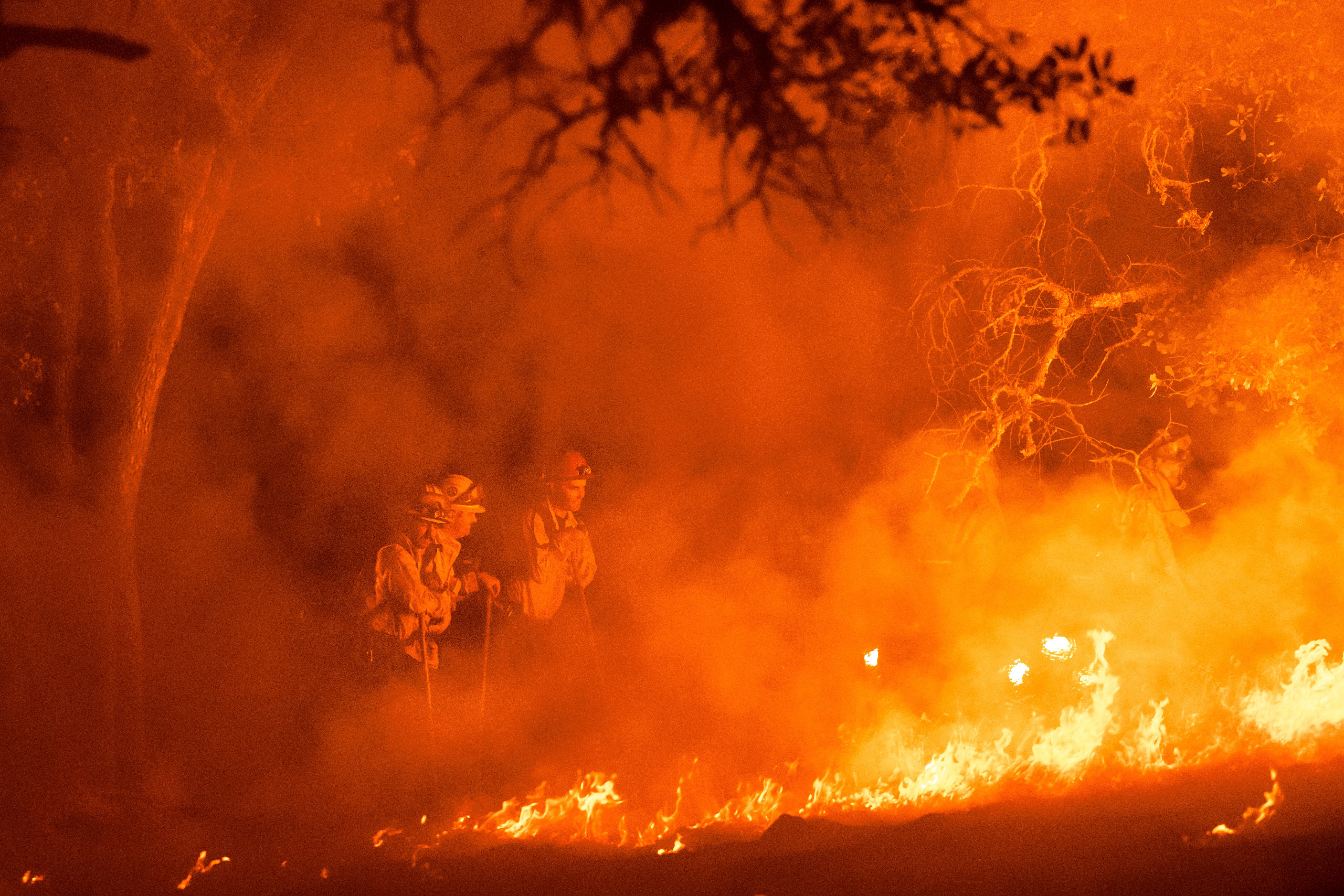 Photos of crews battling the wildfires in Northern California wine country
