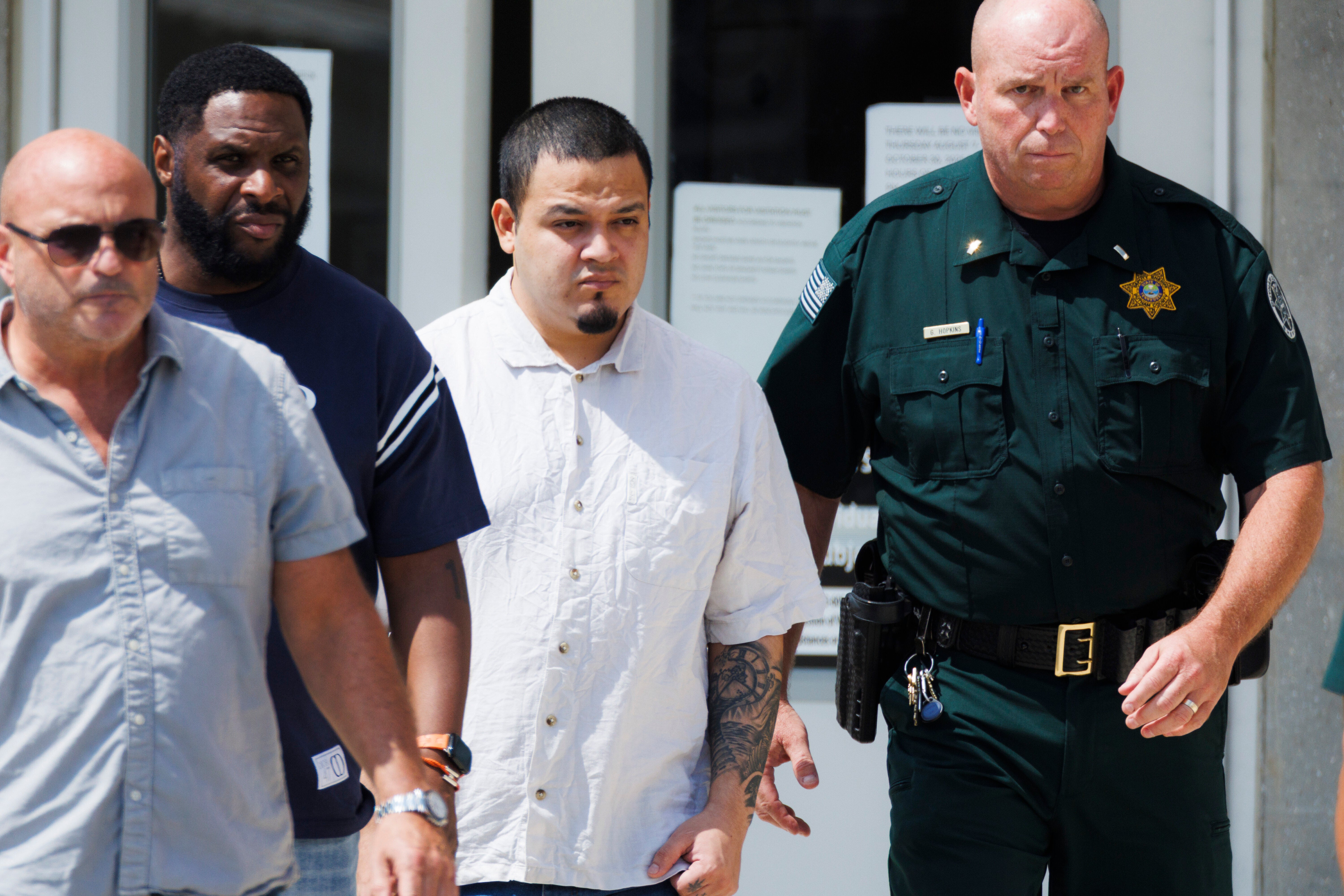 Kilmar Abrego Garcia, second right, leaves the Putnam County Jail in Cookeville, Tennessee on Friday