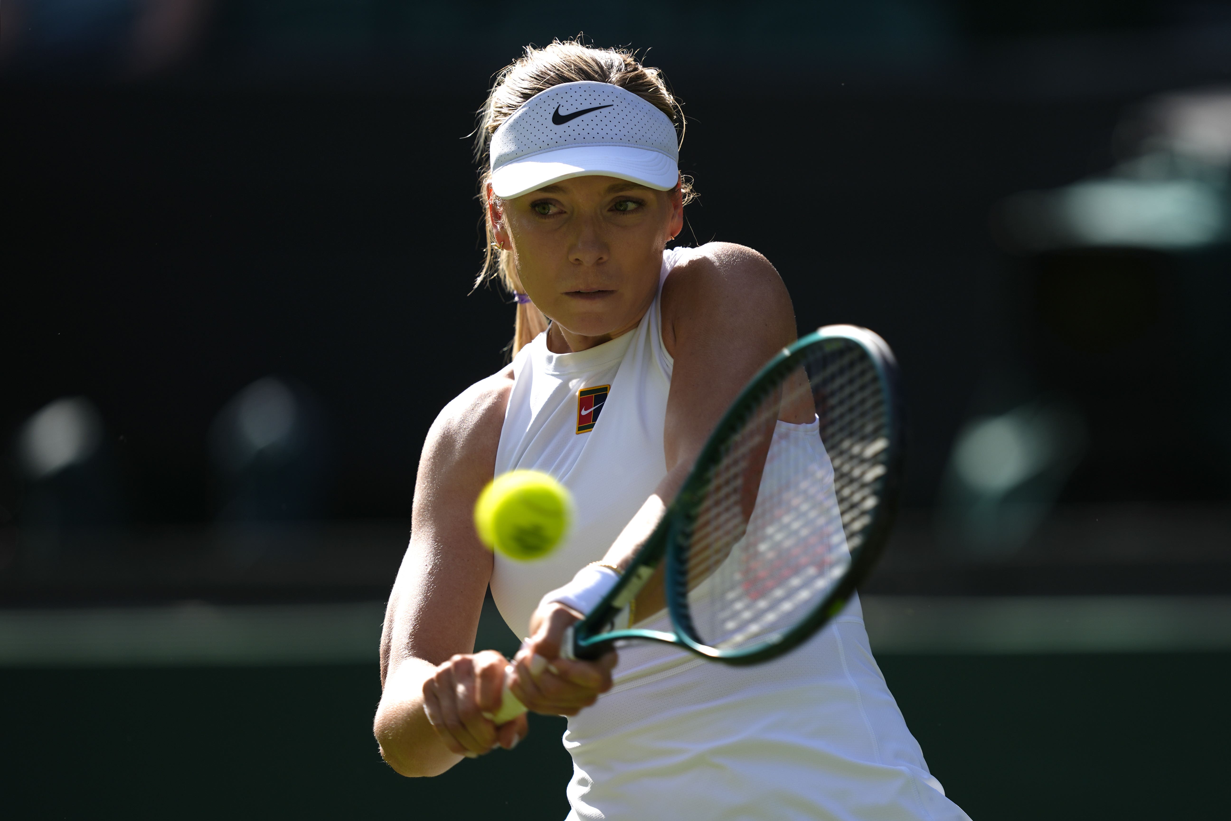 Katie Boulter hits a backhand at Wimbledon (Jordan Pettitt/PA)