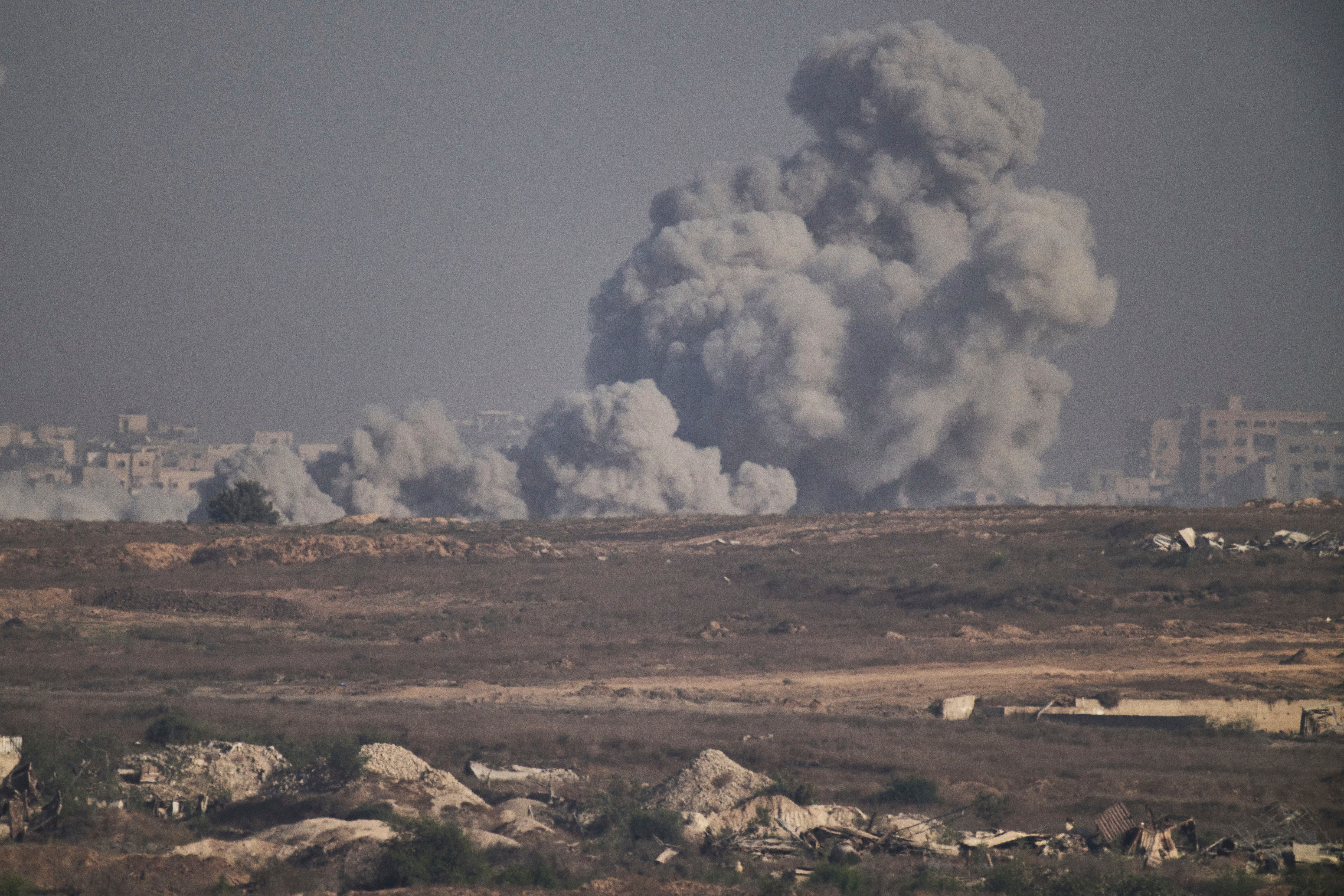 Smoke rises to the sky following an Israeli air strike in the northern Gaza Strip as seen from southern Israel (Leo Correa/AP)