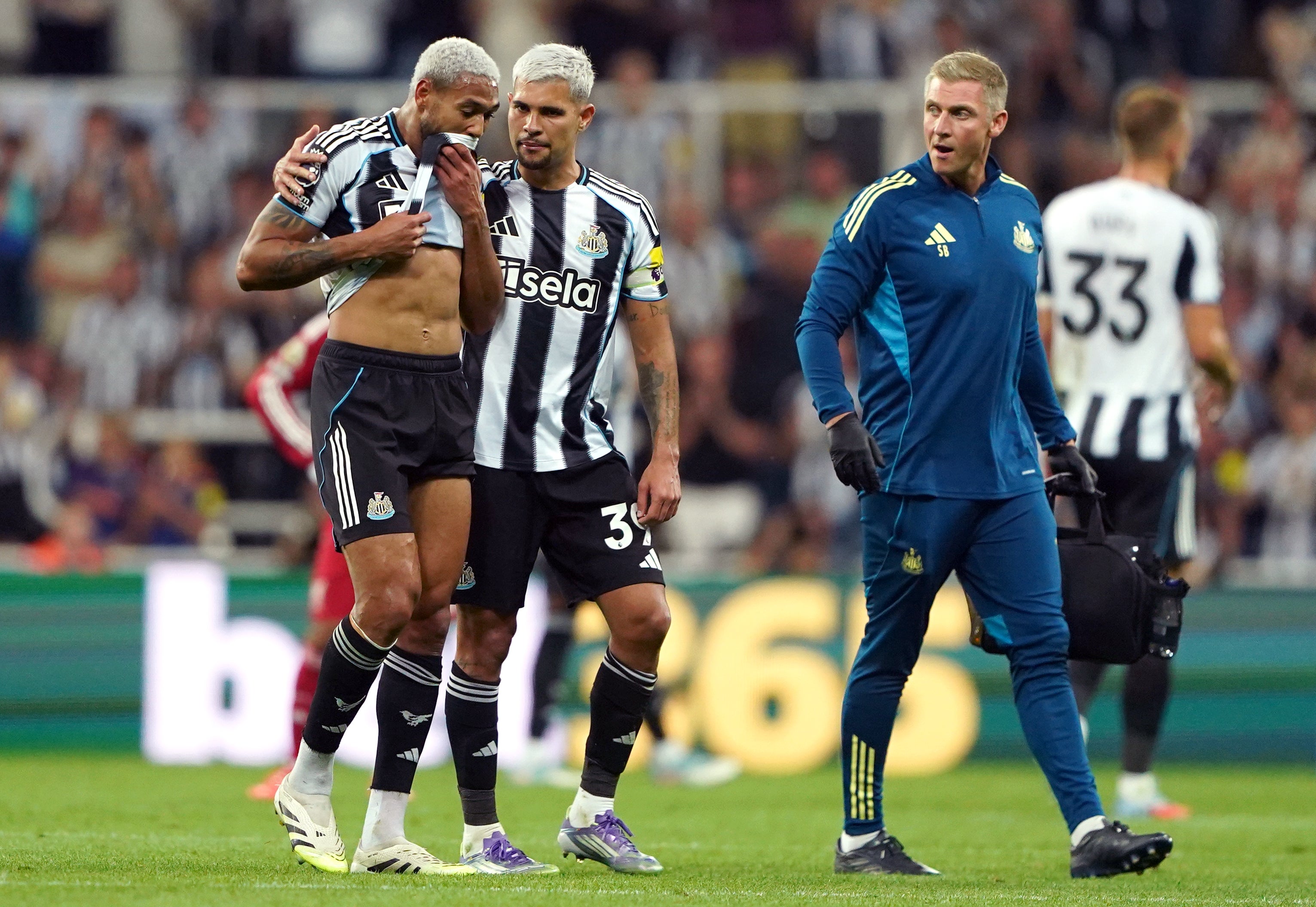 Joelinton (left) was once a failed striker at Newcastle