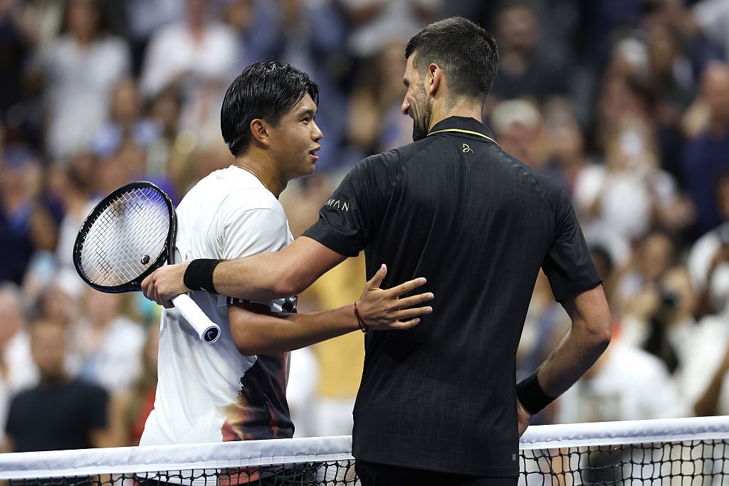 Djokovic and Tien at the net
