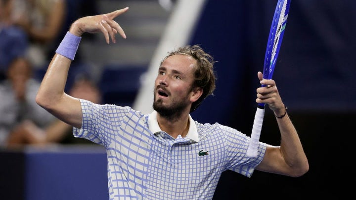 Daniil Medvedev has meltdown after photographer walks on court at US Open match point - before angrily smashing racket on ground