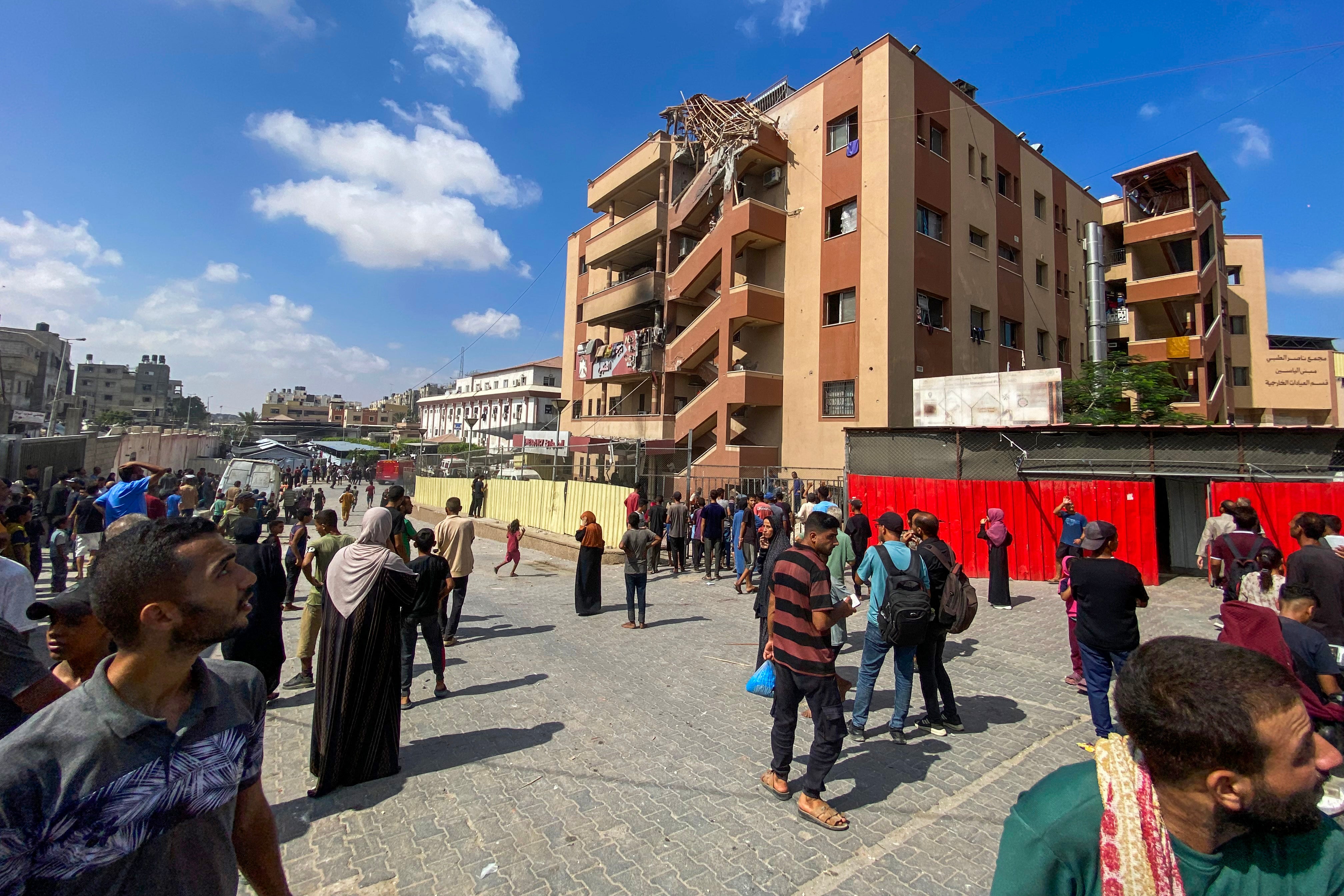 Palestinians gather outside Nasser hospital in Khan Yunis in the southern Gaza Strip on August 25, 2025, following Israeli strikes