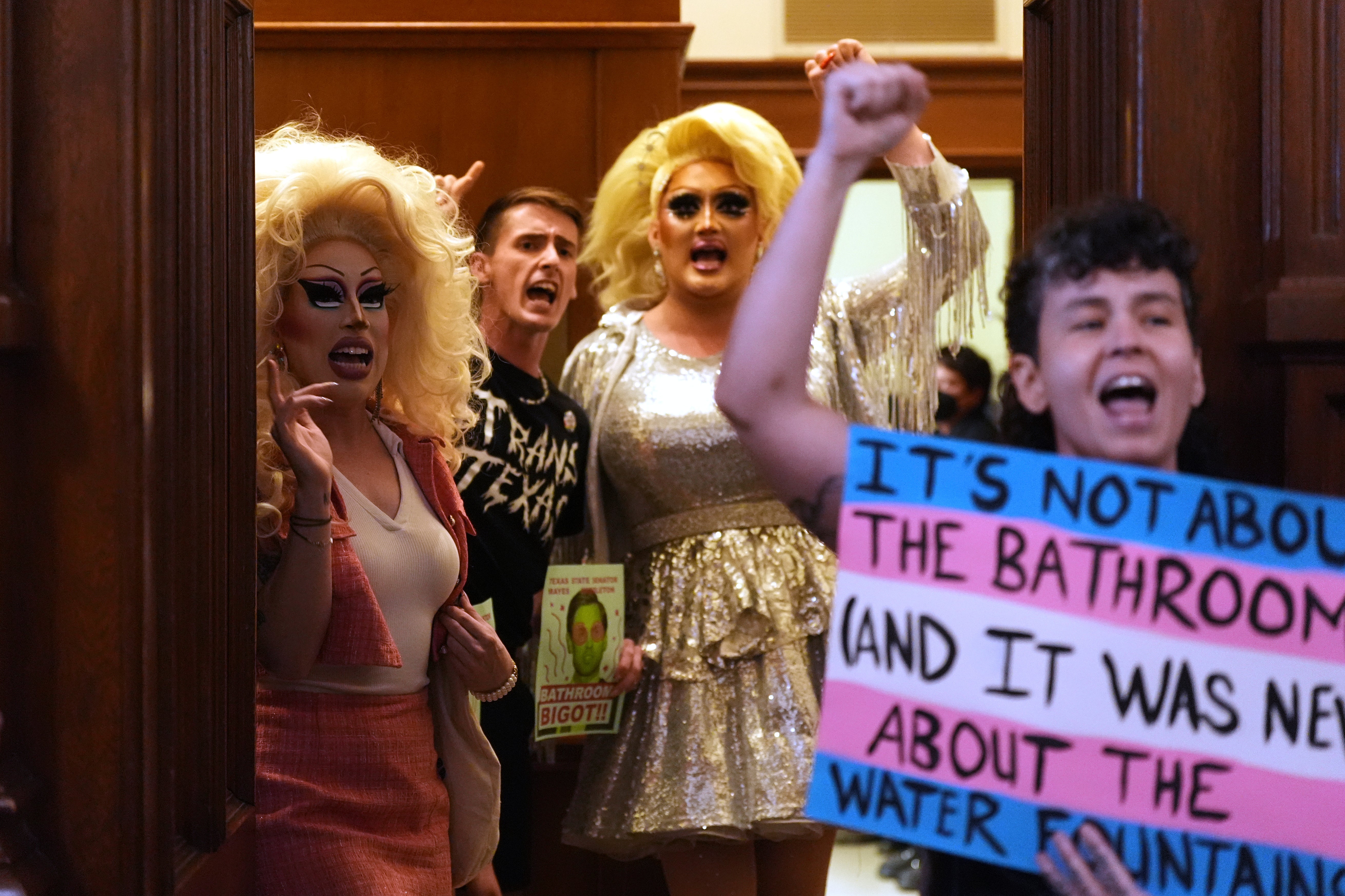 Protesters take over a women's restroom as they speak out against an anti-transgender bathroom bill at the Texas Capitol in Austin, Texas, Friday, Aug. 22, 2025. (AP Photo/Eric Gay)
