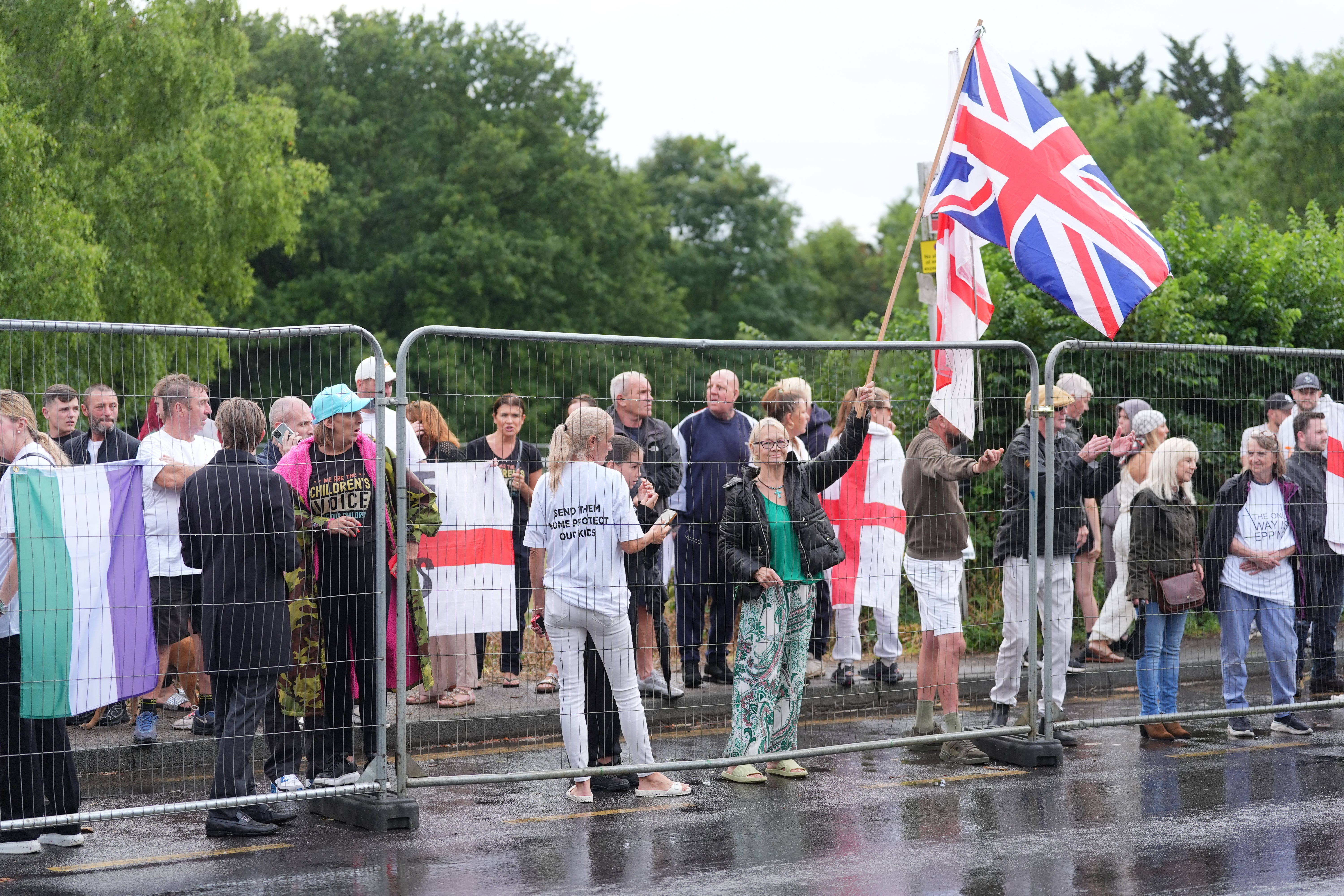 Protesters outside the former Bell Hotel in Epping