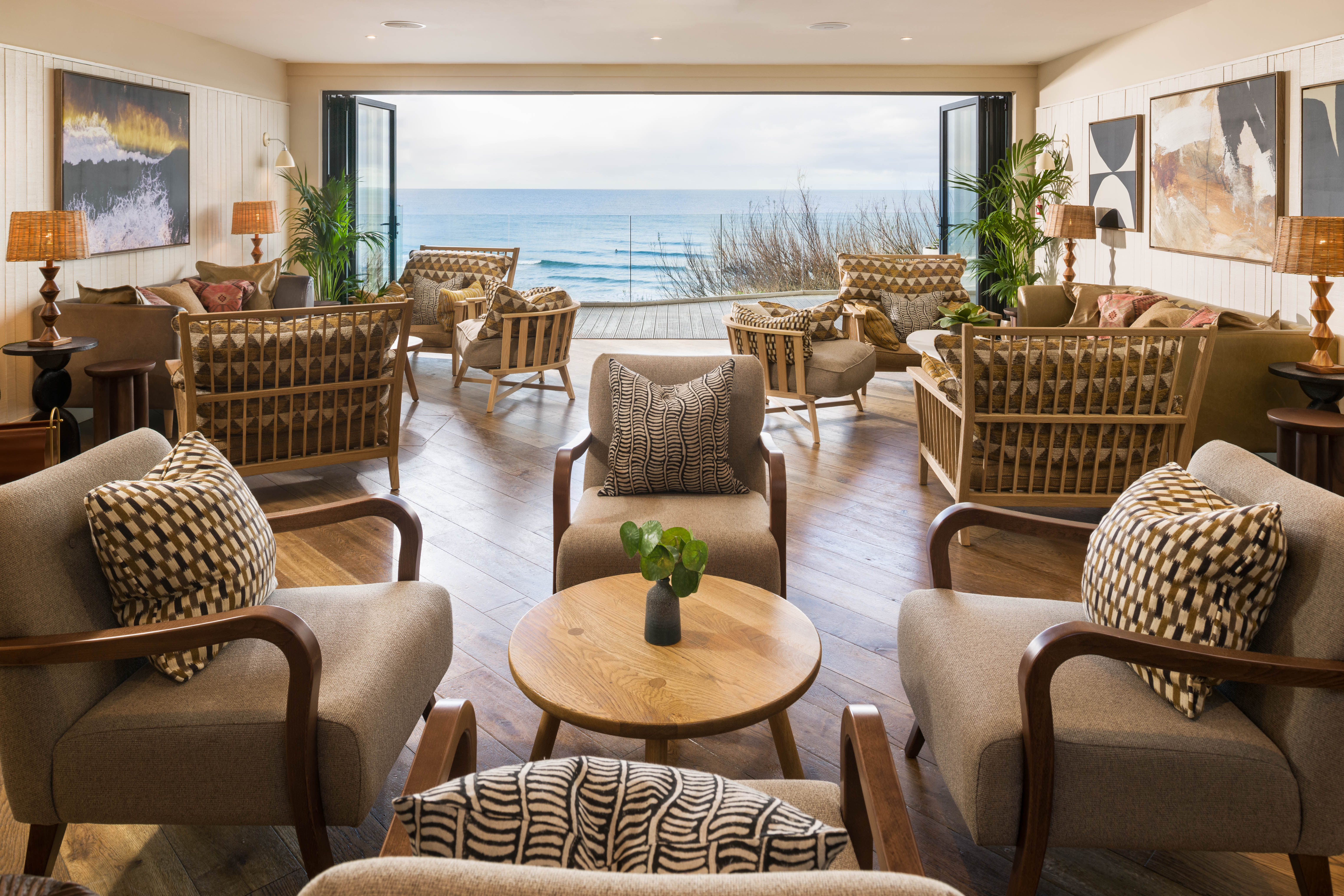 The Living Space snug at Watergate Bay hotel, Cornwall, with views of the sea and the beach