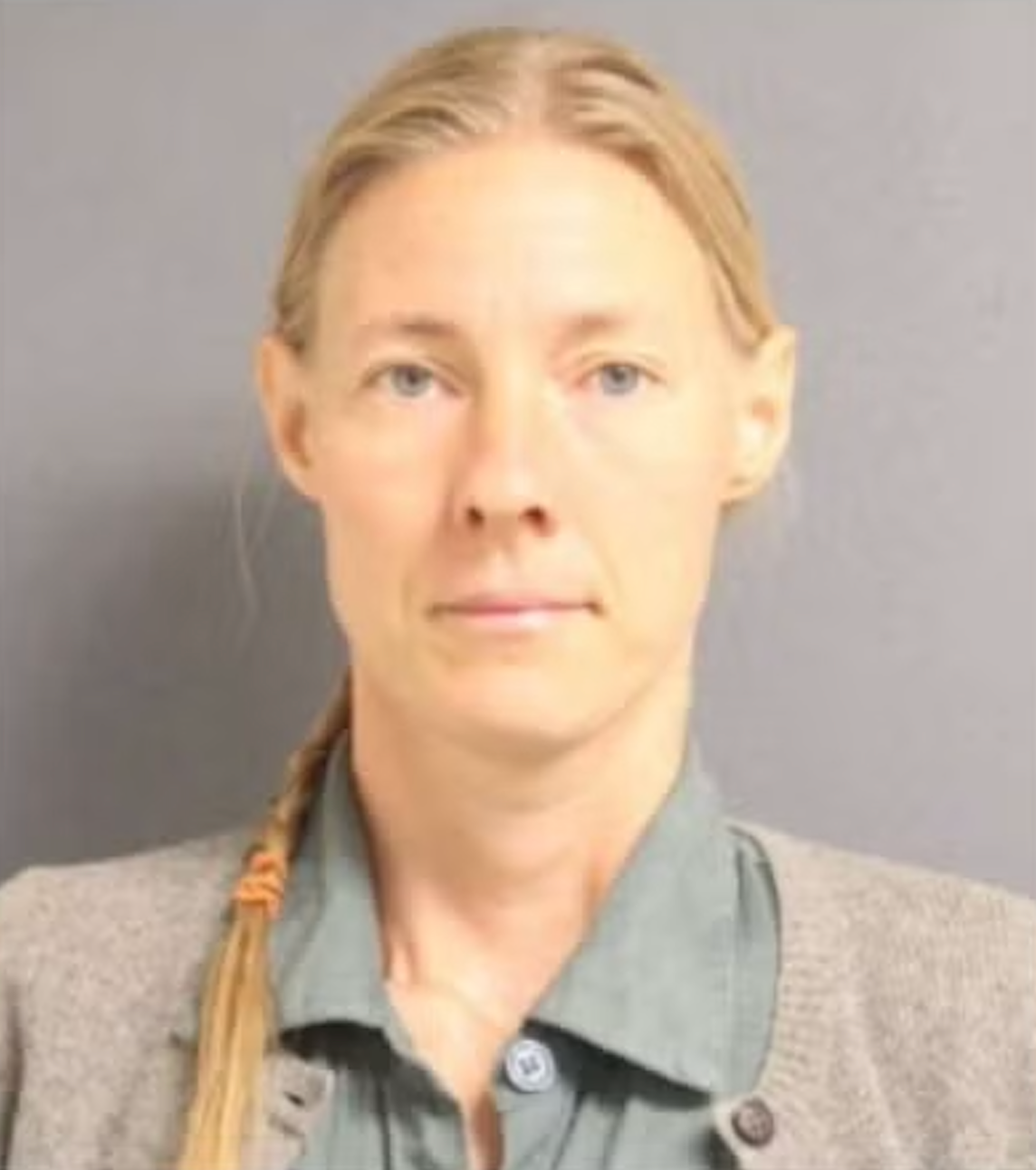 Anastasia Palulis was arrested and charged with with 22 counts in connection to the 21 dogs found dead