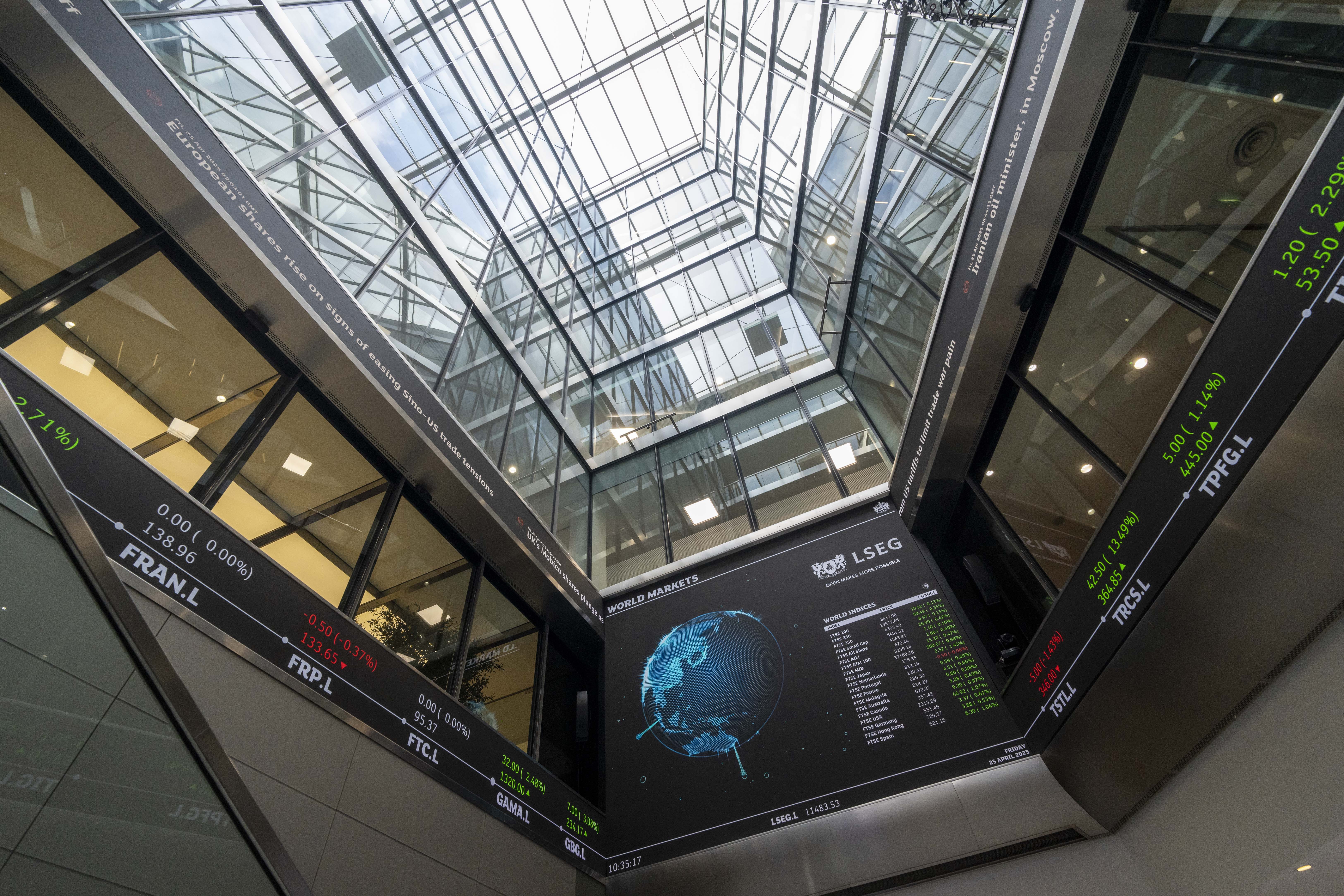 The FTSE 100 index closed down 55.60 points at 9,265.80 (Jeff Moore/PA)