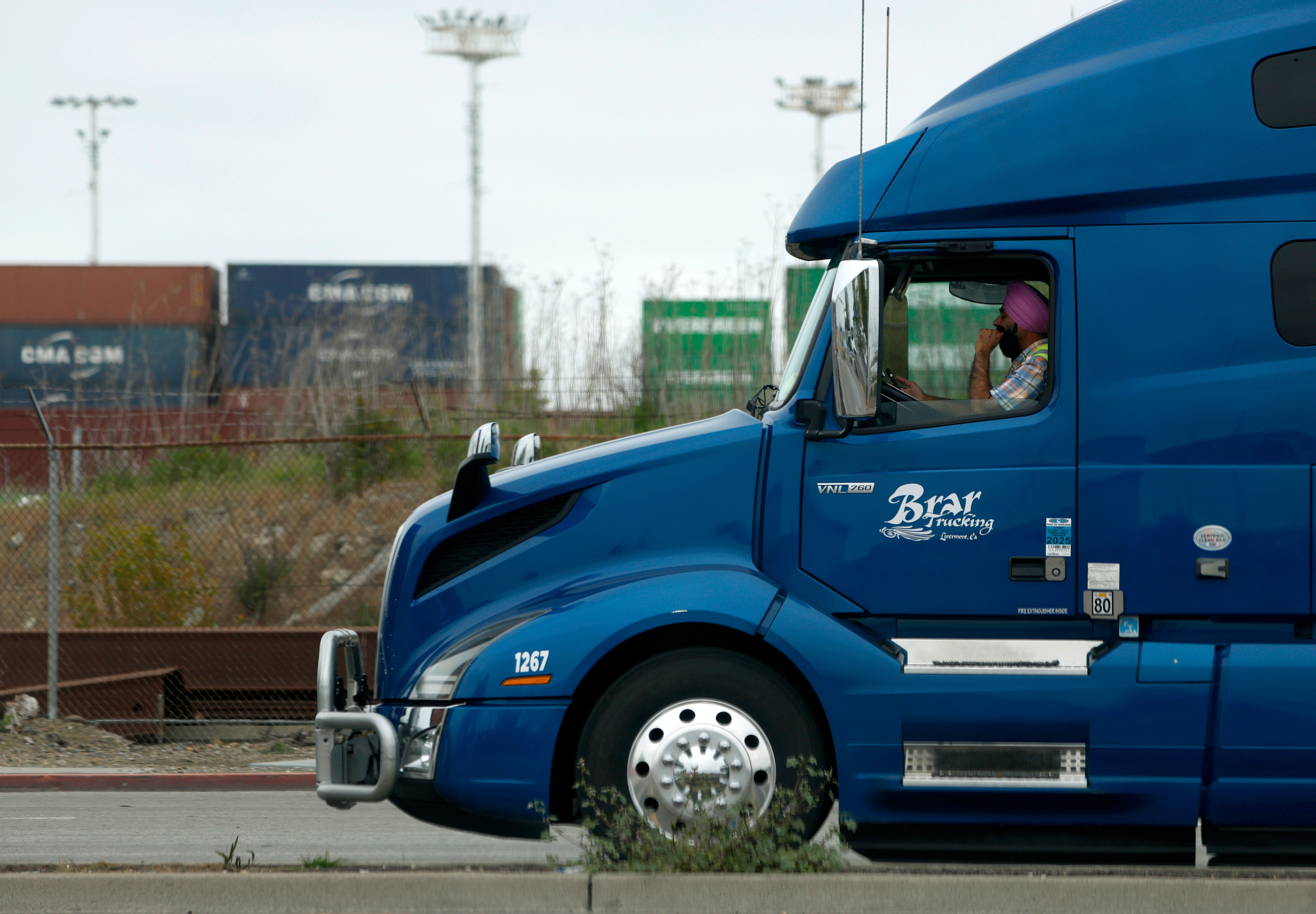 Language standards require truck drivers to be able to recognize and read road signs and communicate with authorities in English
