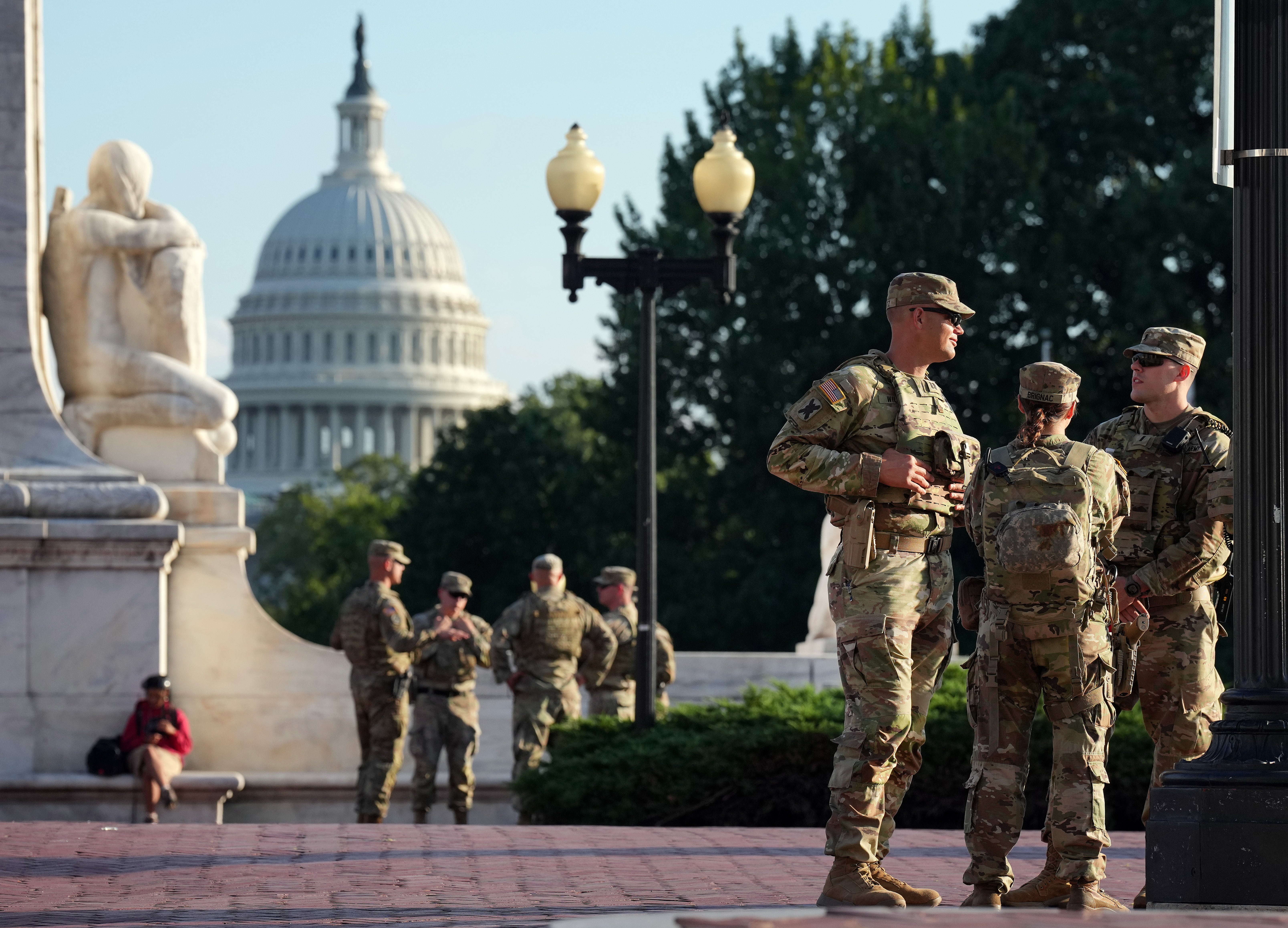 Armed National Guard troops stationed outside the White House in Washington DC on Monday