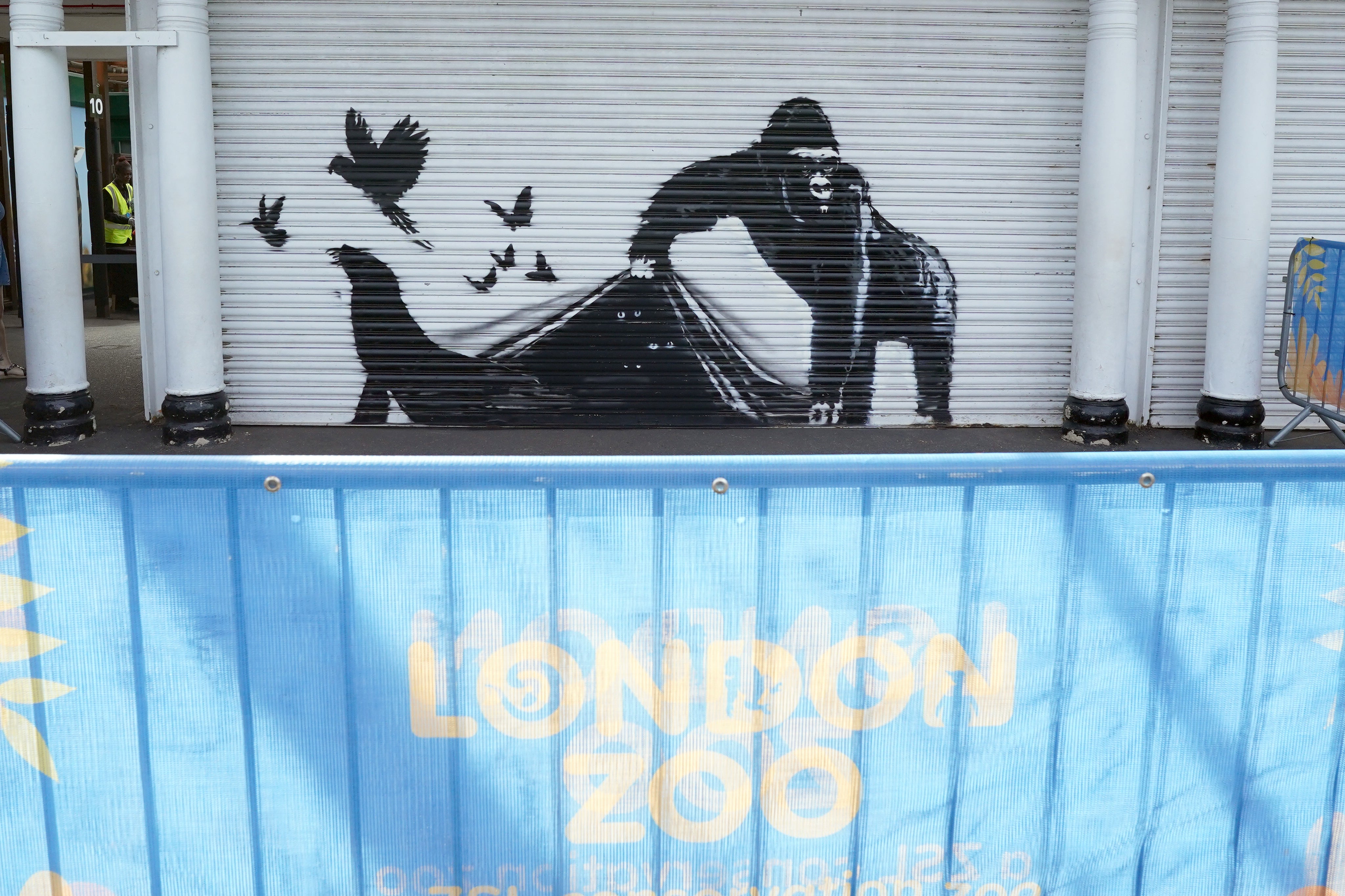 The Banksy series included a gorilla lifting the edge of a shutter at the entrance to London Zoo