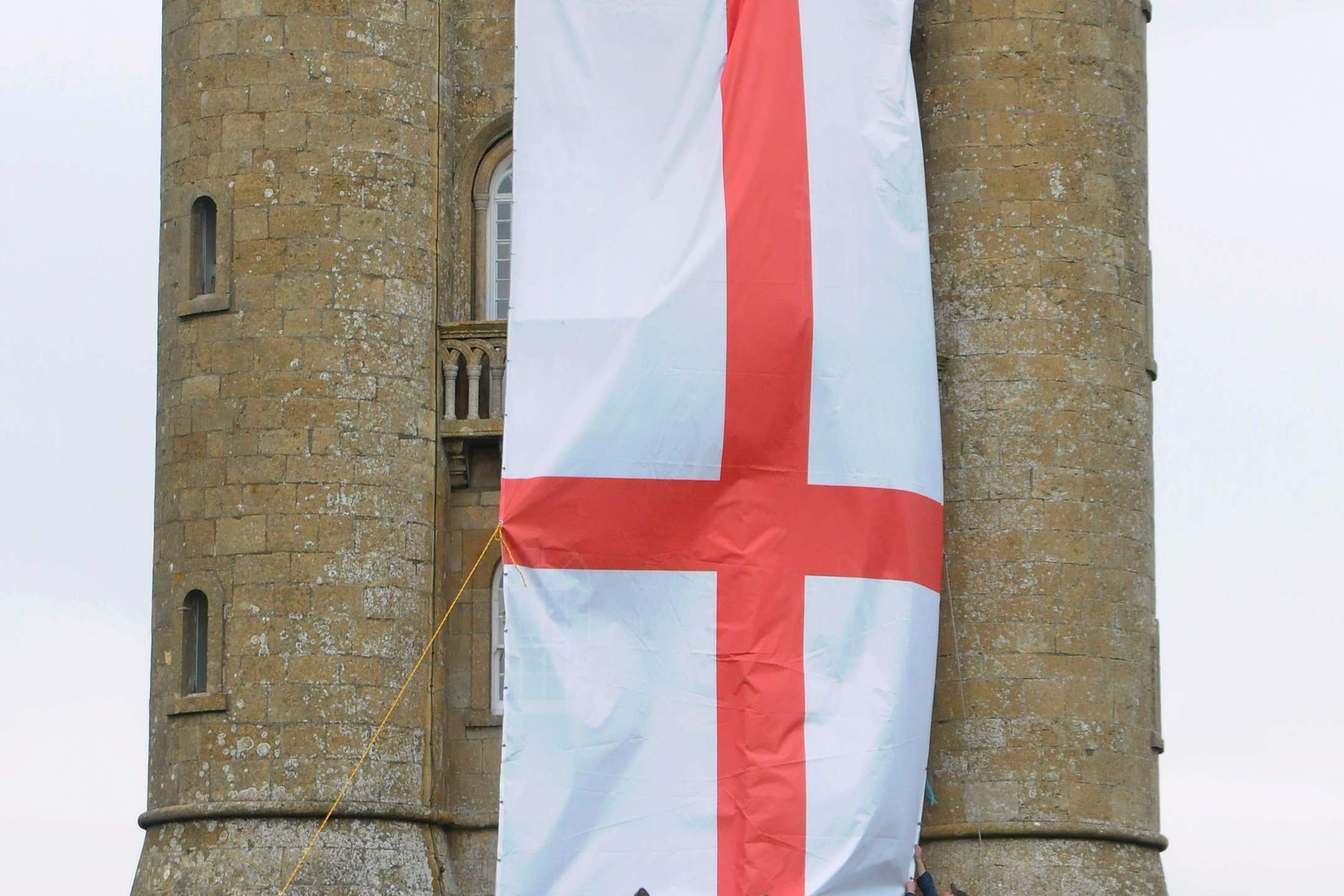Broadway Tower in Worcestershire is dressed in the flag of St George as part of the celebrations marking the start of asparagus season. (Joe Giddens/PA)