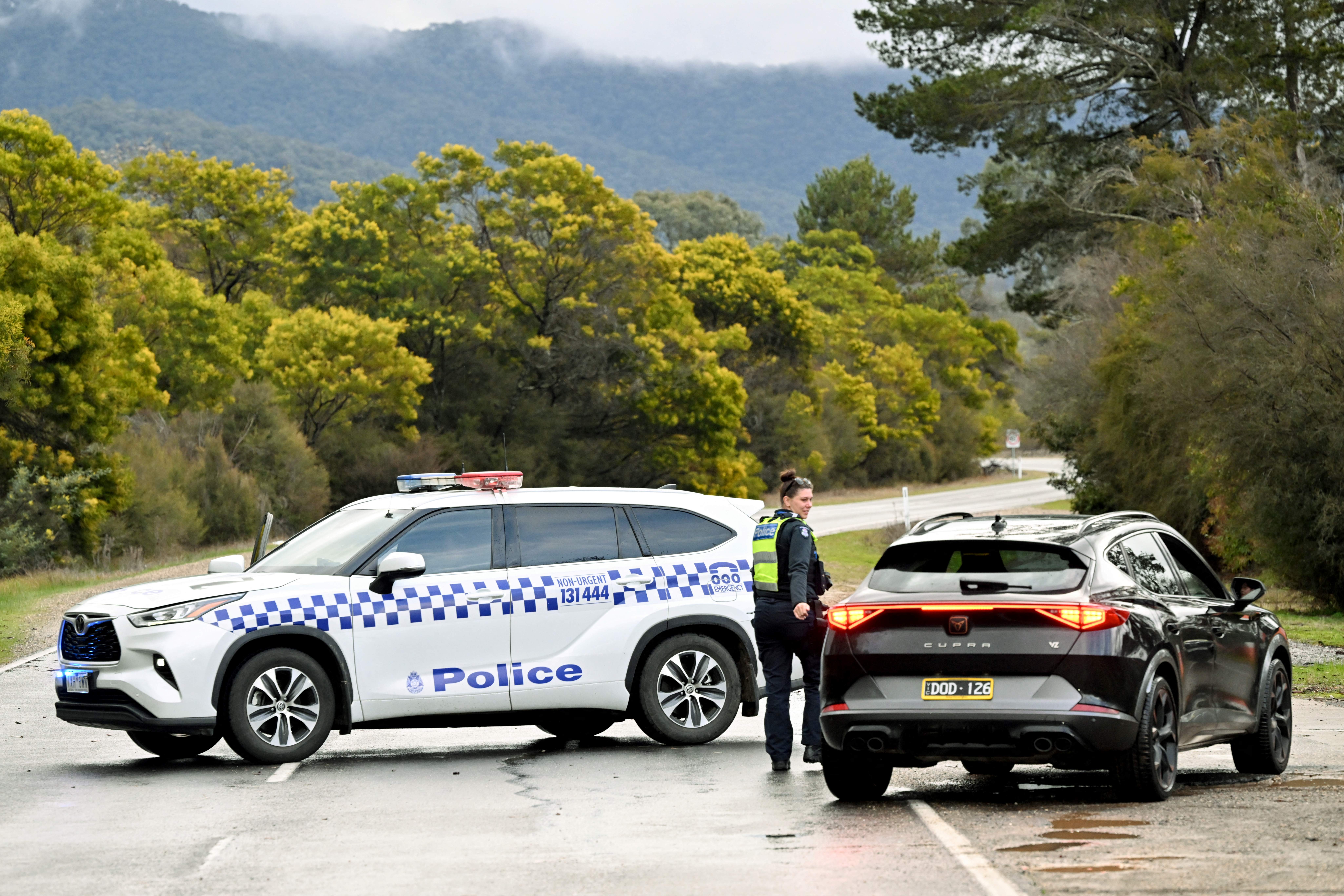 Police searched the Australian bush on 27 August 2025, for a heavily armed 56-year-old gunman still on the run a day after allegedly killing two officers and wounding a third