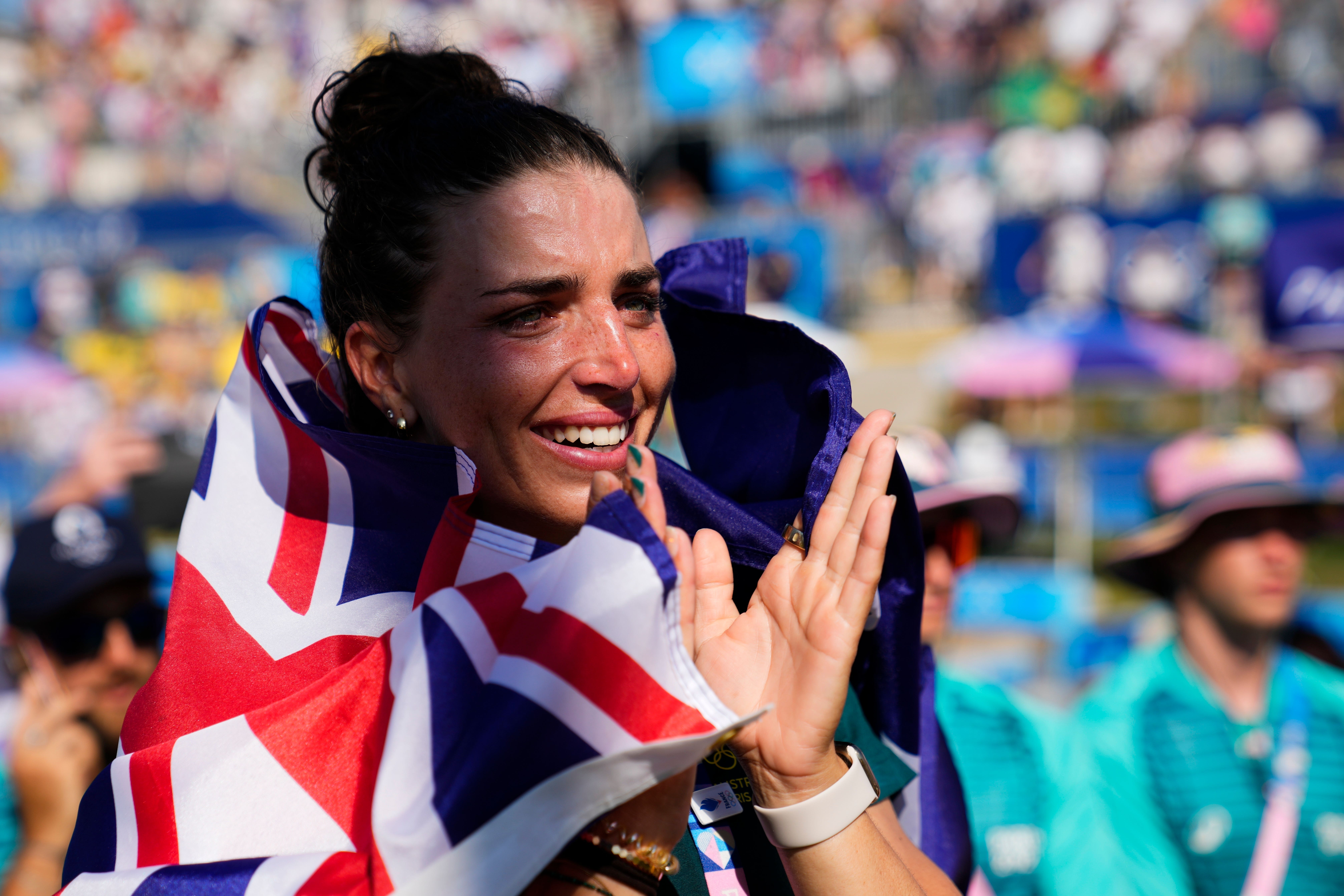 Jessica Fox celebrates her sister Noemie Fox of Australia winning a gold medal in the women’s kayak cross finals during the canoe slalom at the 2024 Summer Olympics (Ebrahim Noroozi/AP, File)