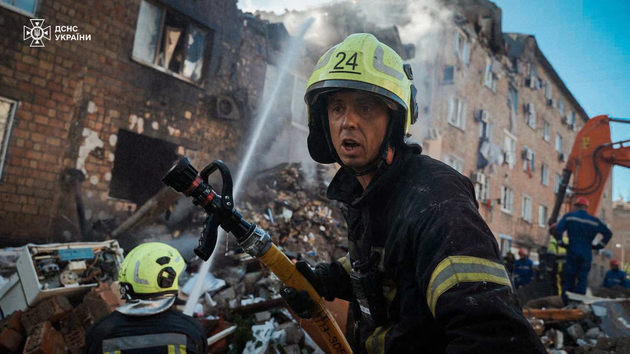 Rescuers dug through rubble on Kyiv’s left bank to recover bodies while fire-fighters battled blazes in residential buildings