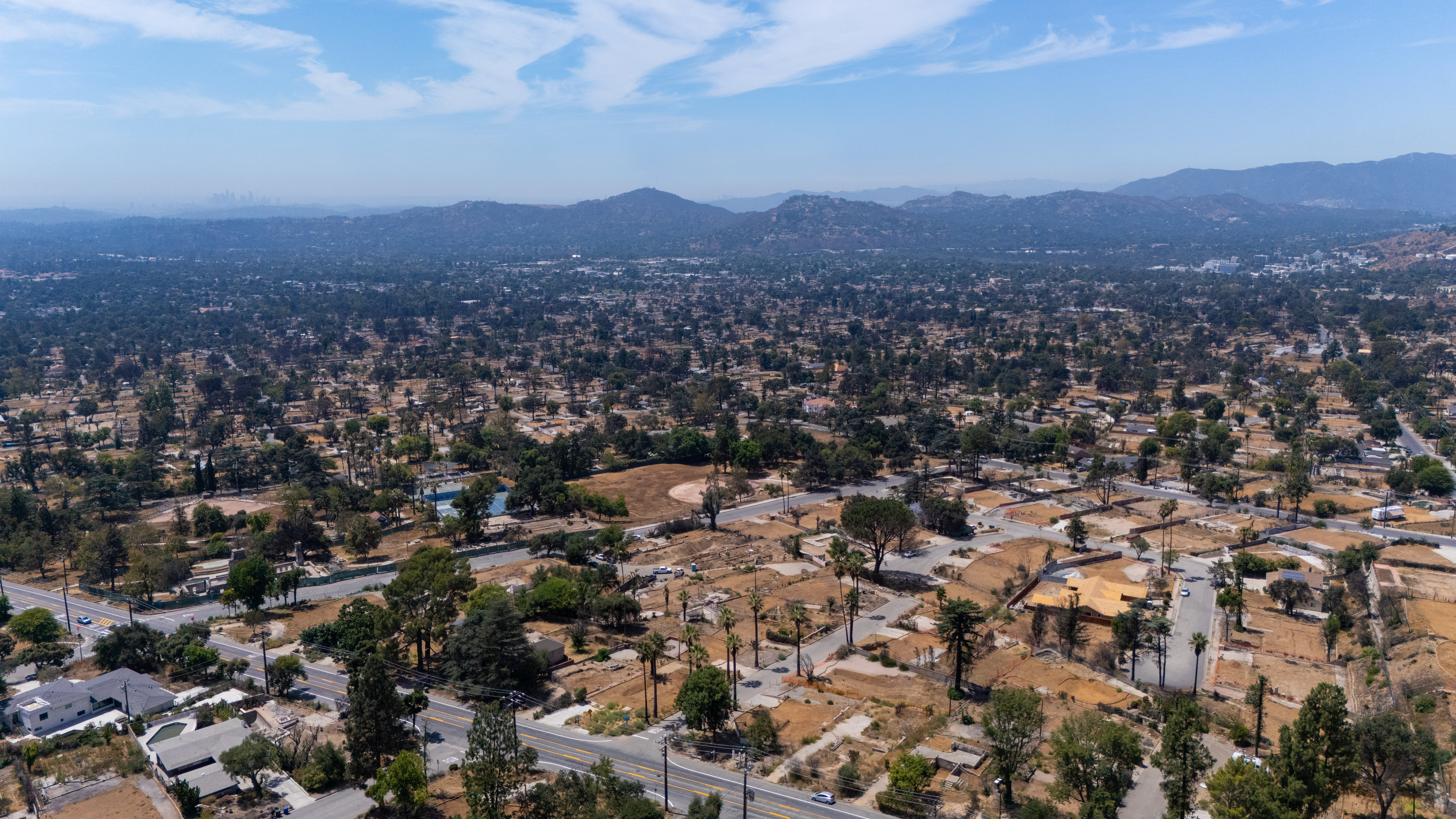 Vacant lots where homes once stood are shown in their drone view following the Eaton Fire
