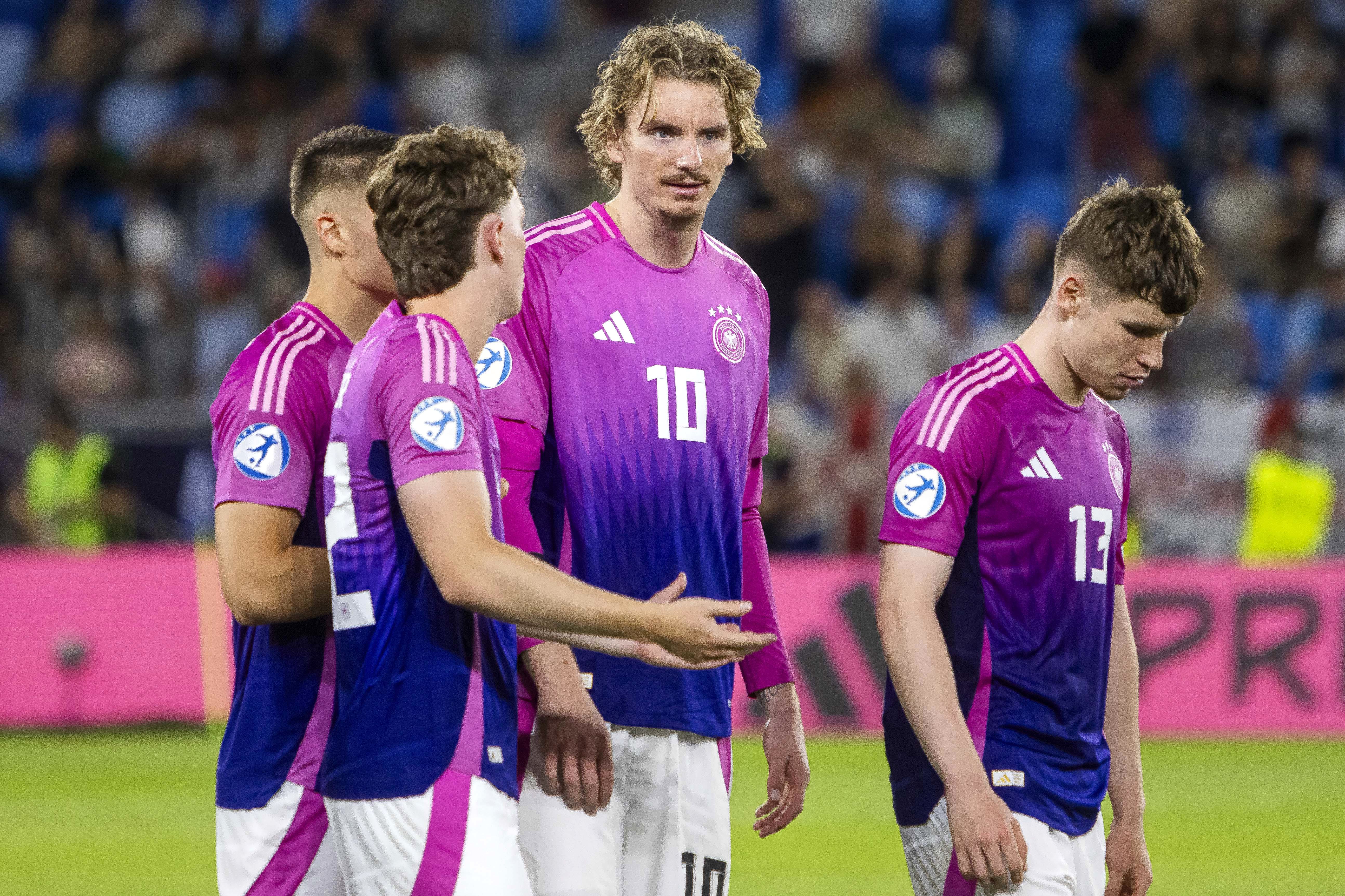 Nick Woltemade, centre, could join Newcastle (PA)