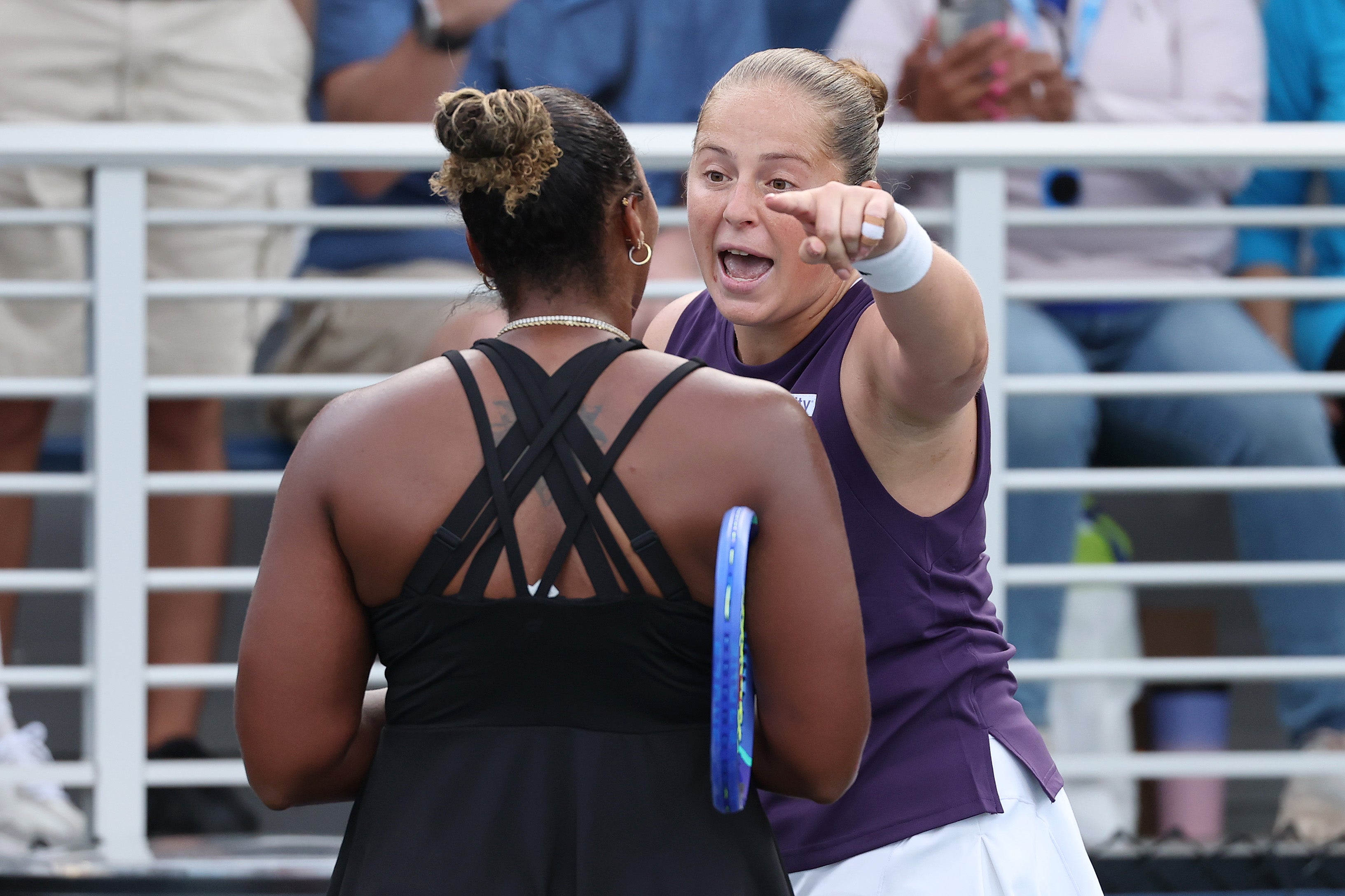 Jelana Ostapenko argues with Taylor Townsend after their second round match at the US Open