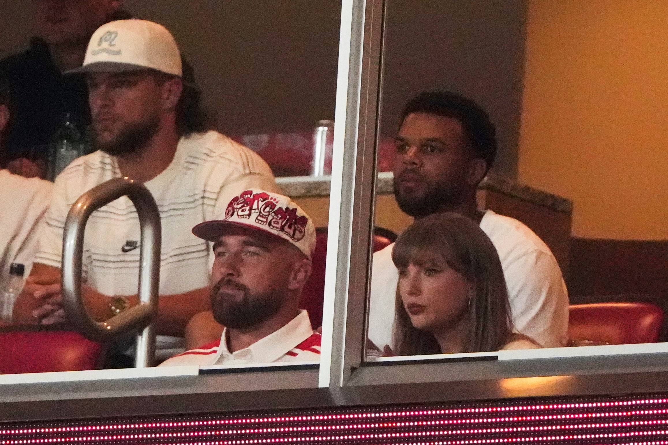 Taylor Swift and Travis Kelce spotted at college football game in Kansas City