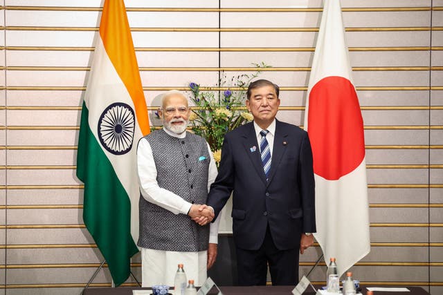 <p>India's Prime Minister Narendra Modi and Japan's Prime Minister Shigeru Ishiba shake hands during a meeting in Tokyo, Japan August 29, 2025</p>