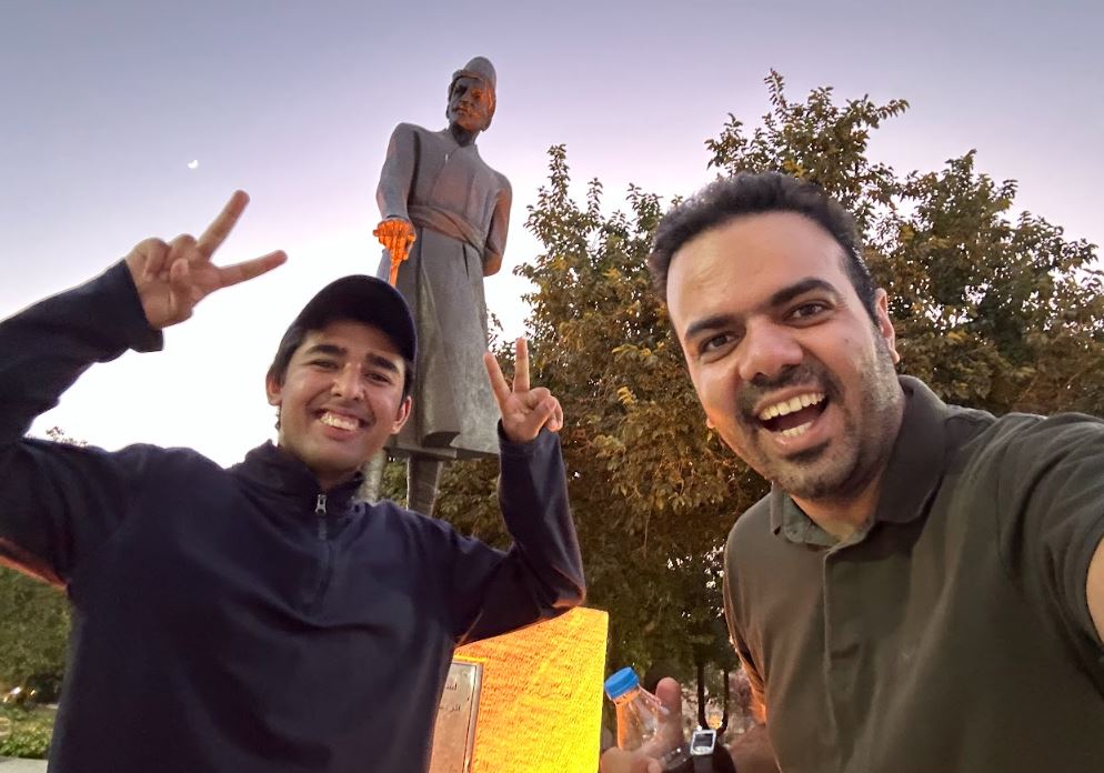 Arjun with a local resident in Iraq, a country that had 'excellent' food and overall was a 'surprisingly positive experience'