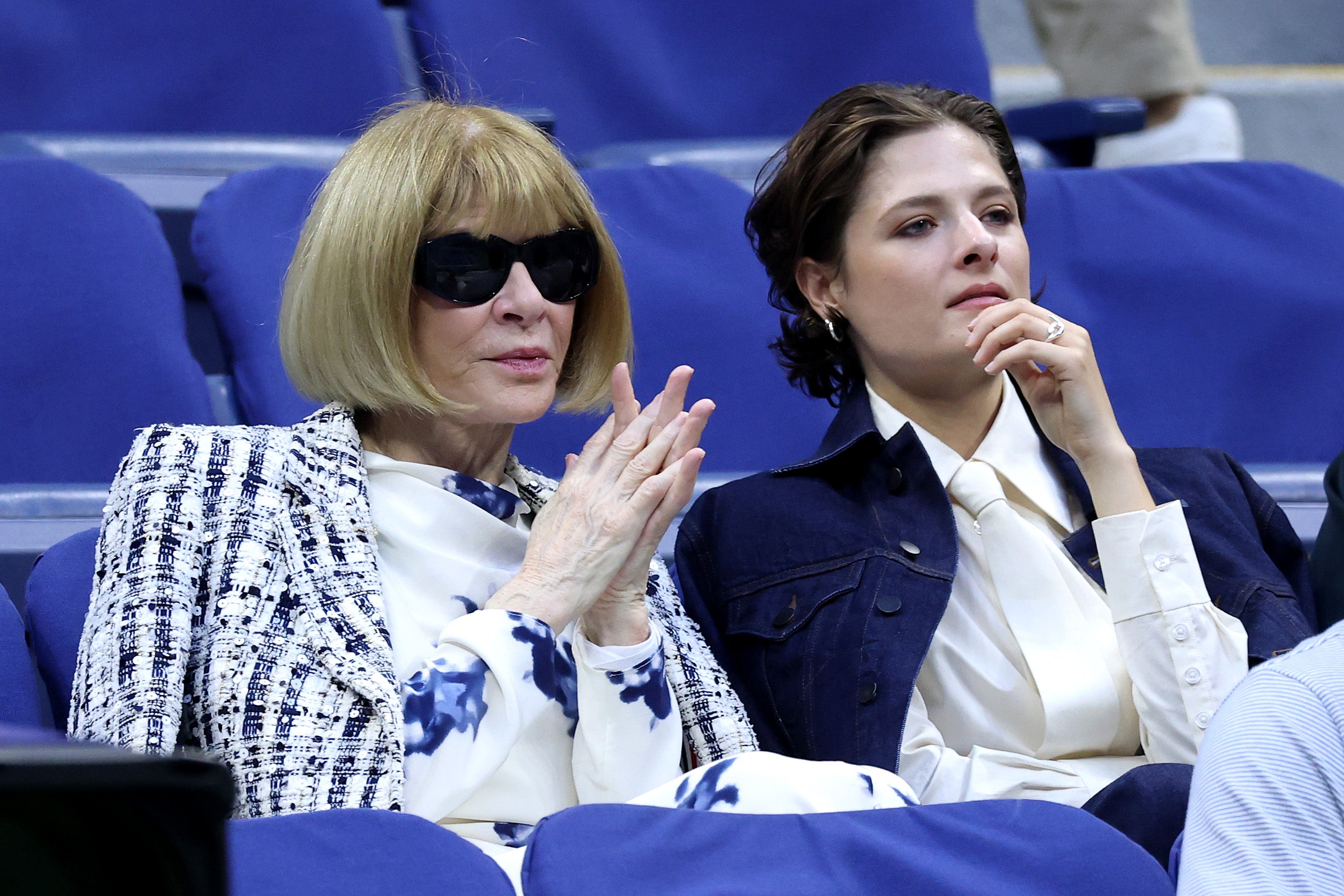 Anna Wintour looked classier than ever in her blue and white dress at the tennis event August 28. She paired the outfit with a striped jacket and her signature black sunglasses