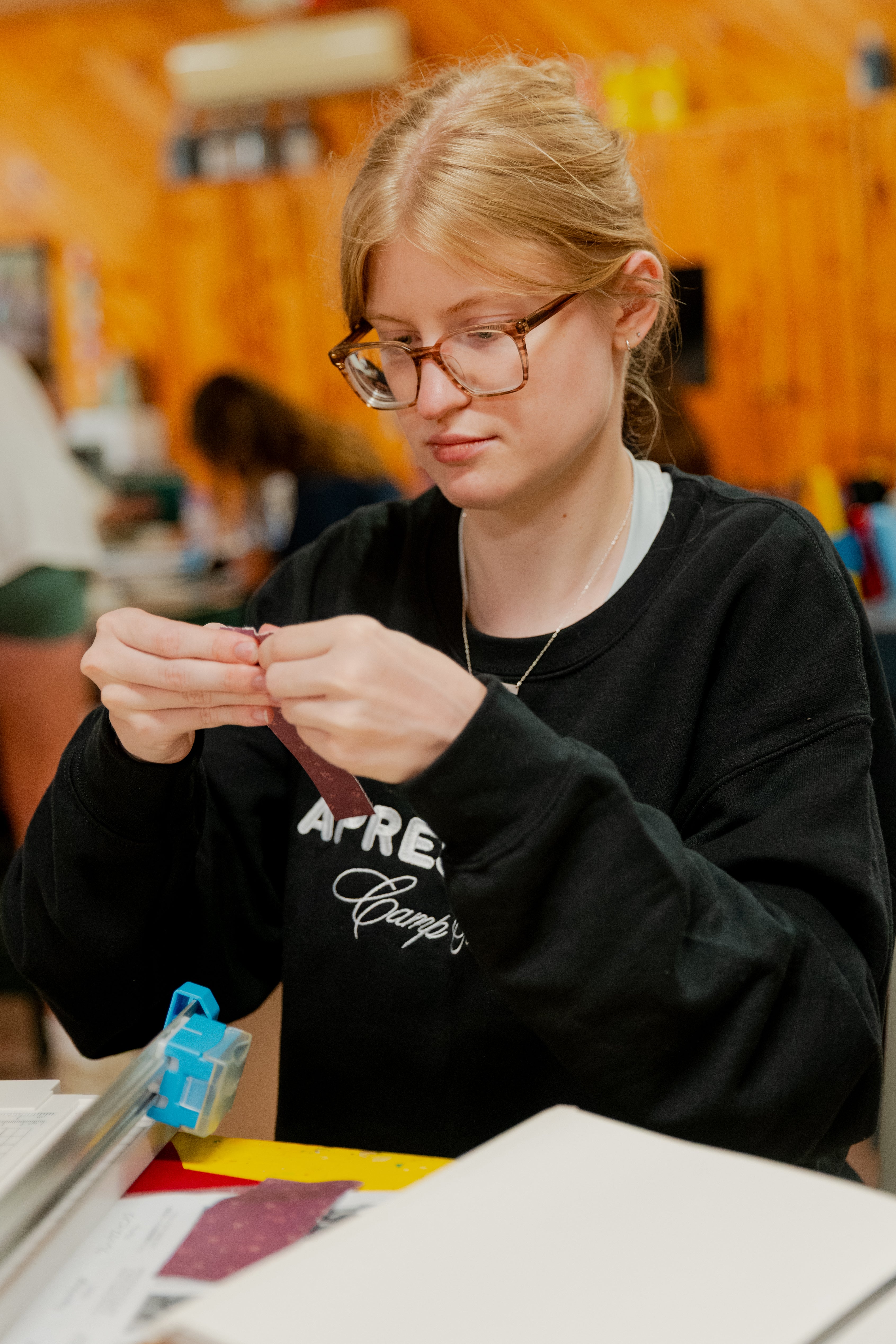 The author on her last day at camp, taking advantage of the scrapbook supplies
