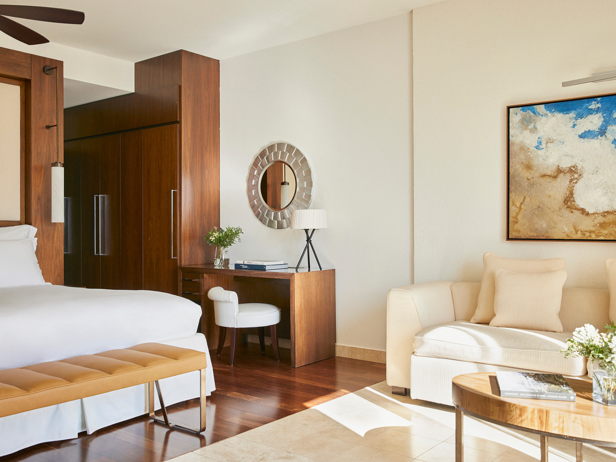 The rooms are sleek and comfortable, offering a soothing place to relax with private sun loungers on generous balconies