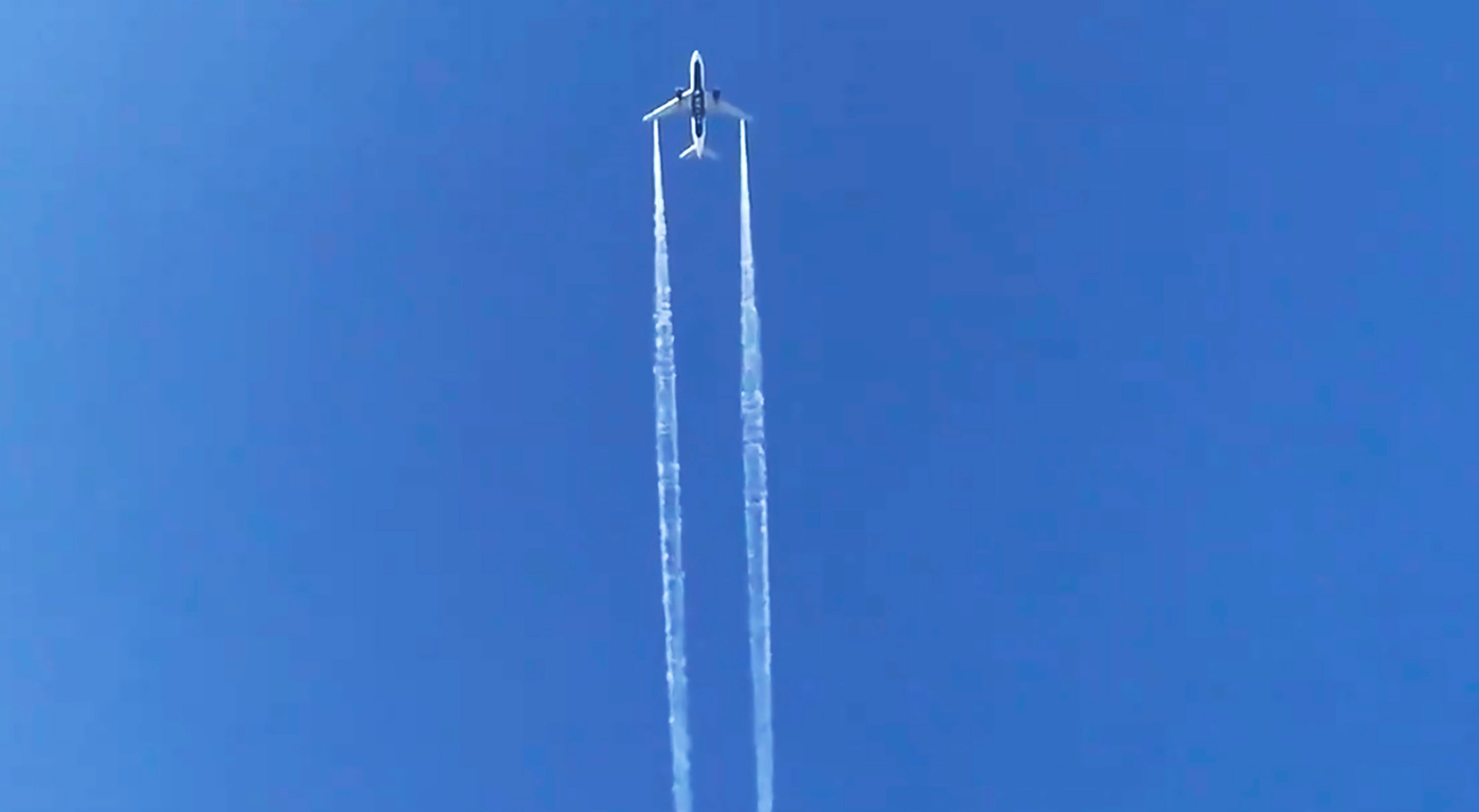 In this photo from video, Delta Air Lines Flight 89 to Shanghai, China dumps fuel over Los Angeles before returning to Los Angeles International Airport for an emergency landing on Jan. 14, 2020