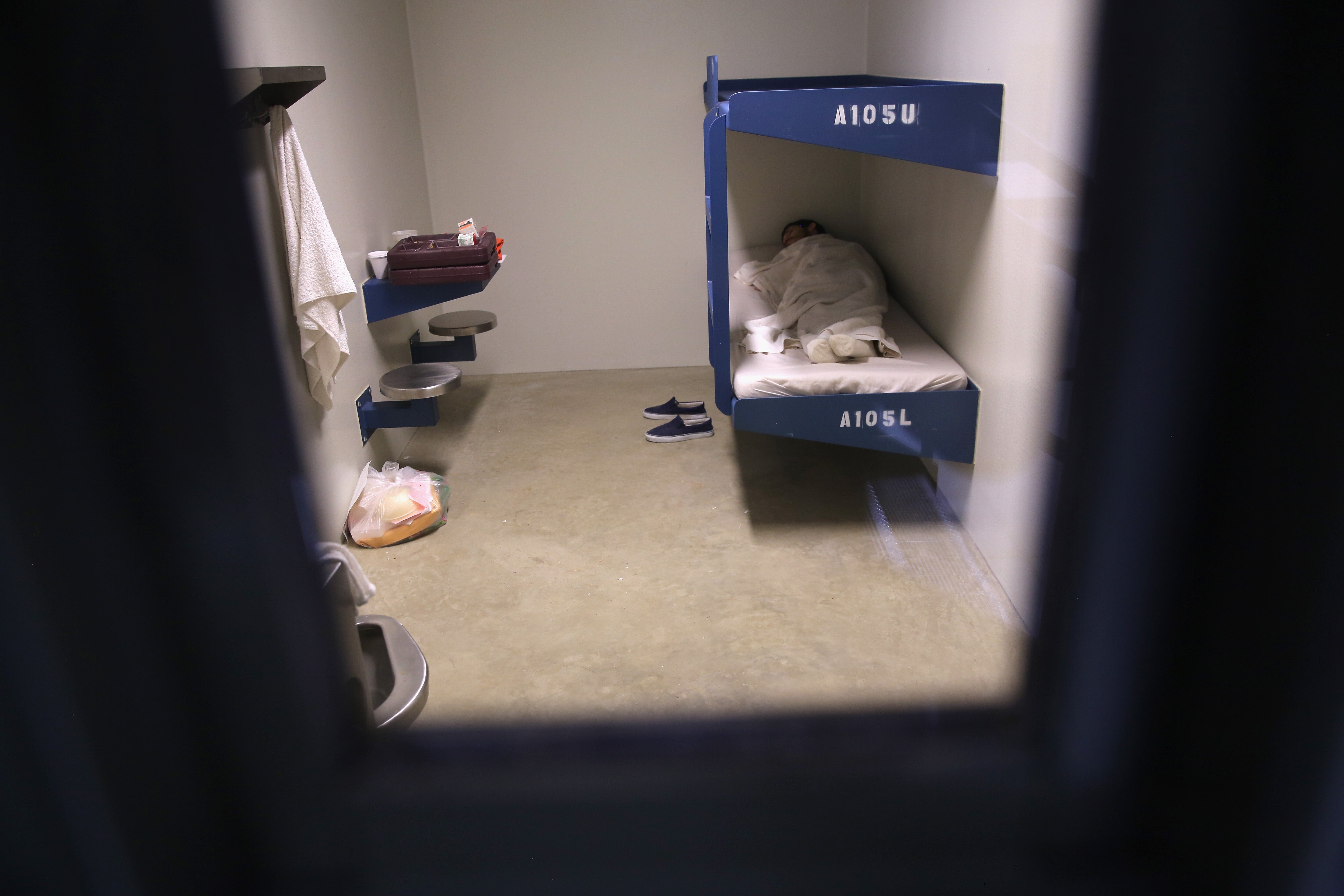 Chaplain Mark Melhorn allegedly assaulted 'Jane Doe' in a cell similar to this one, at a privately-run ICE facility in Pennsylvania. She is now suing the federal government, the clergyman and the GEO Group, which operates the jail