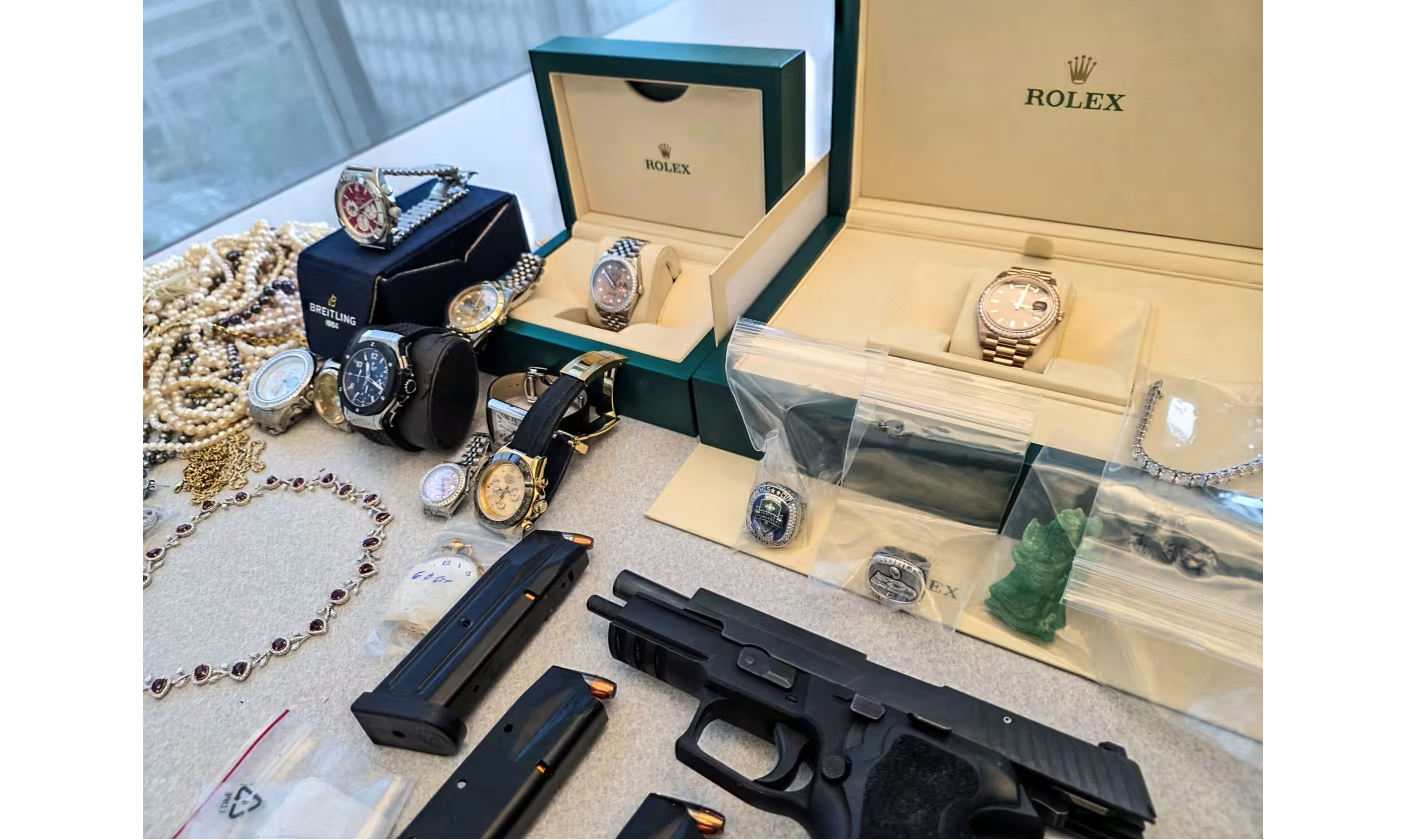 Watches, jewelry, and a handgun were among the items recovered by Seattle Police Department investigators after they executed a search warrant at a jewelry store that allegedly purchased the stolen goods from thieves. Items belonging to the rapper Macklemore were among the recovered goods