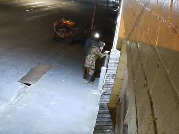 Police believe footage shows fugitive father Tom Phillips and one of his children breaking into a shop in the rural town of Piopio